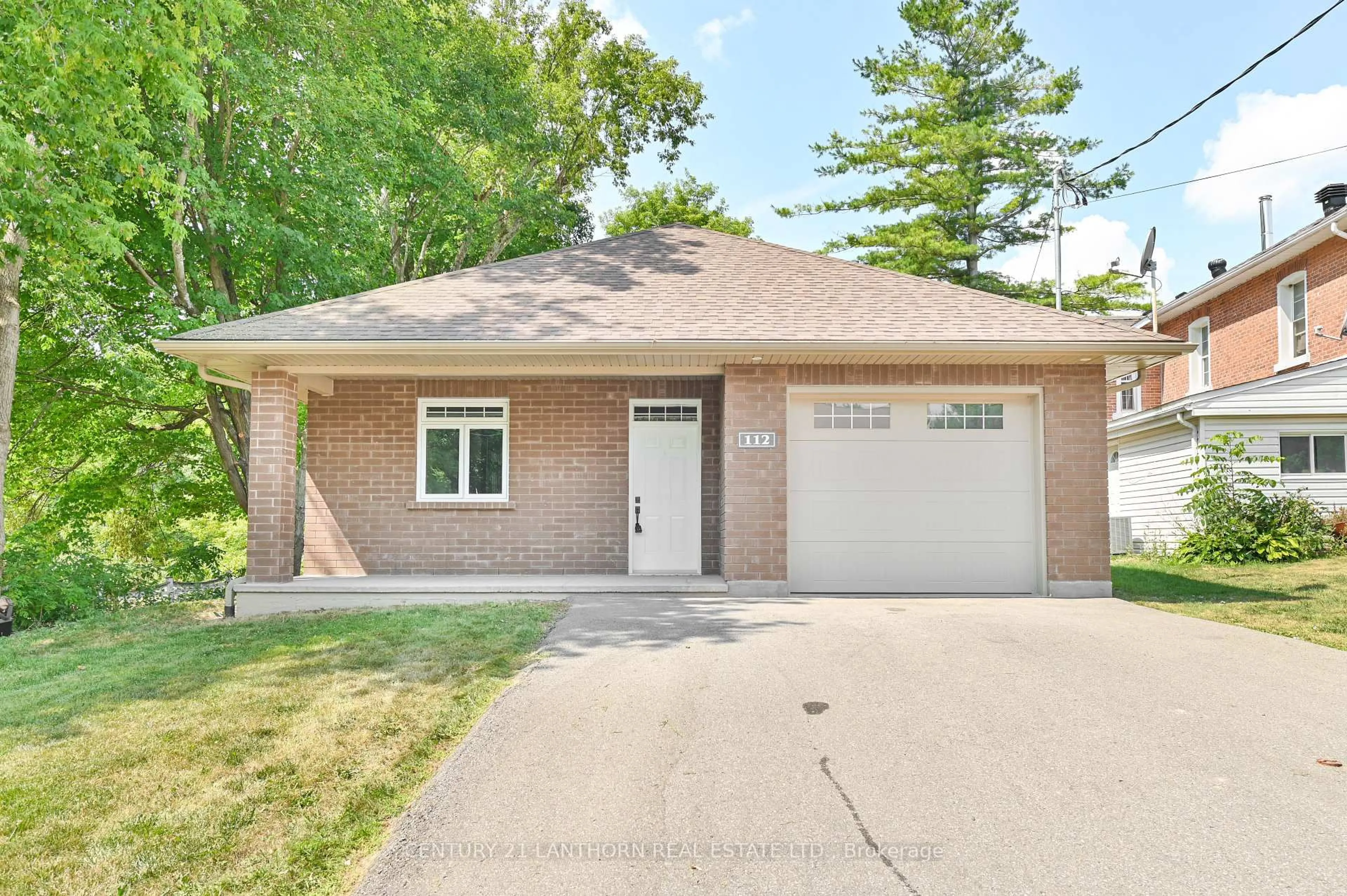 Home with brick exterior material, street for 112 Rollins St, Madoc Ontario K0K 2K0