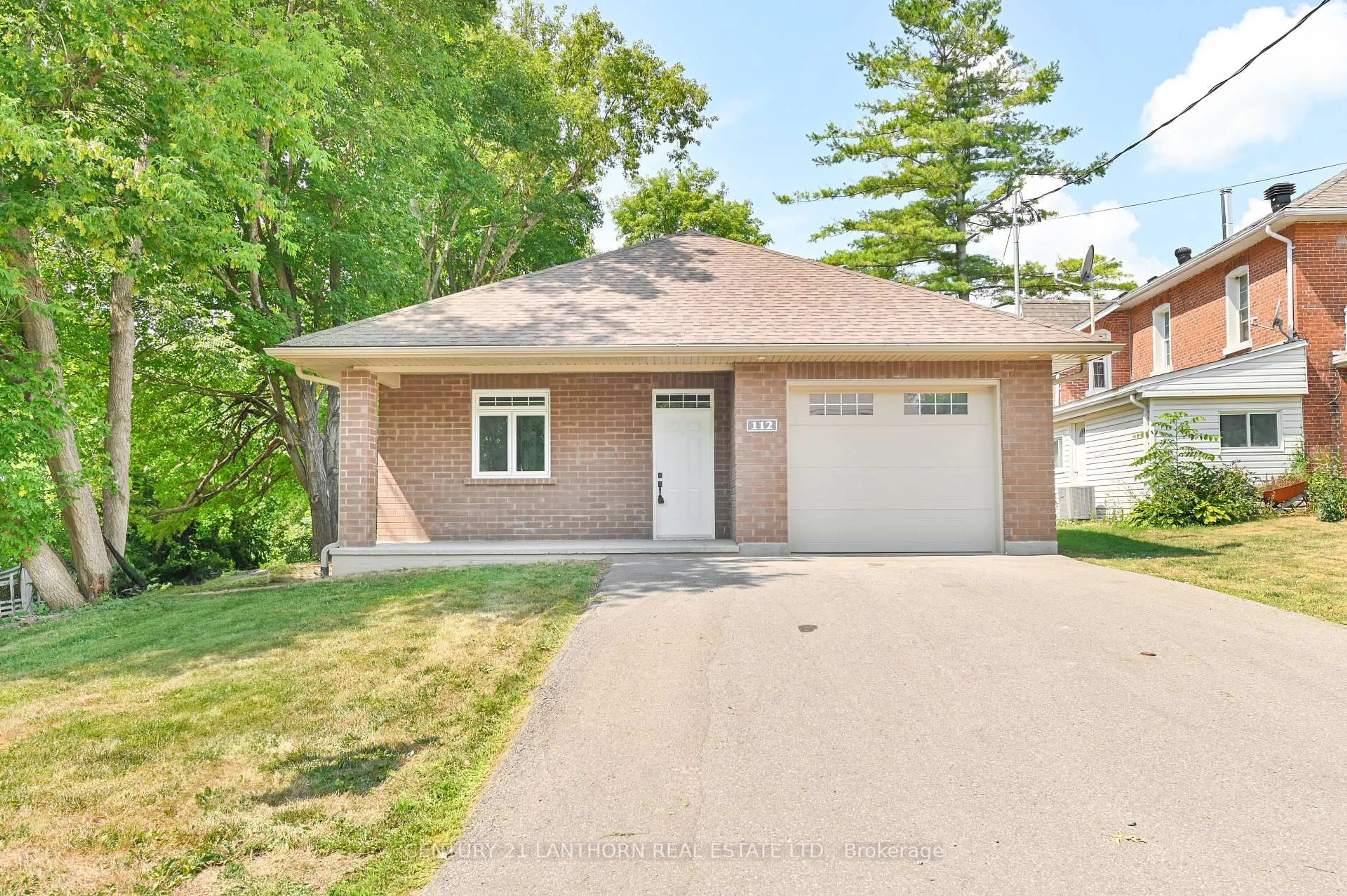 Home with brick exterior material, street for 112 Rollins St, Madoc Ontario K0K 2K0