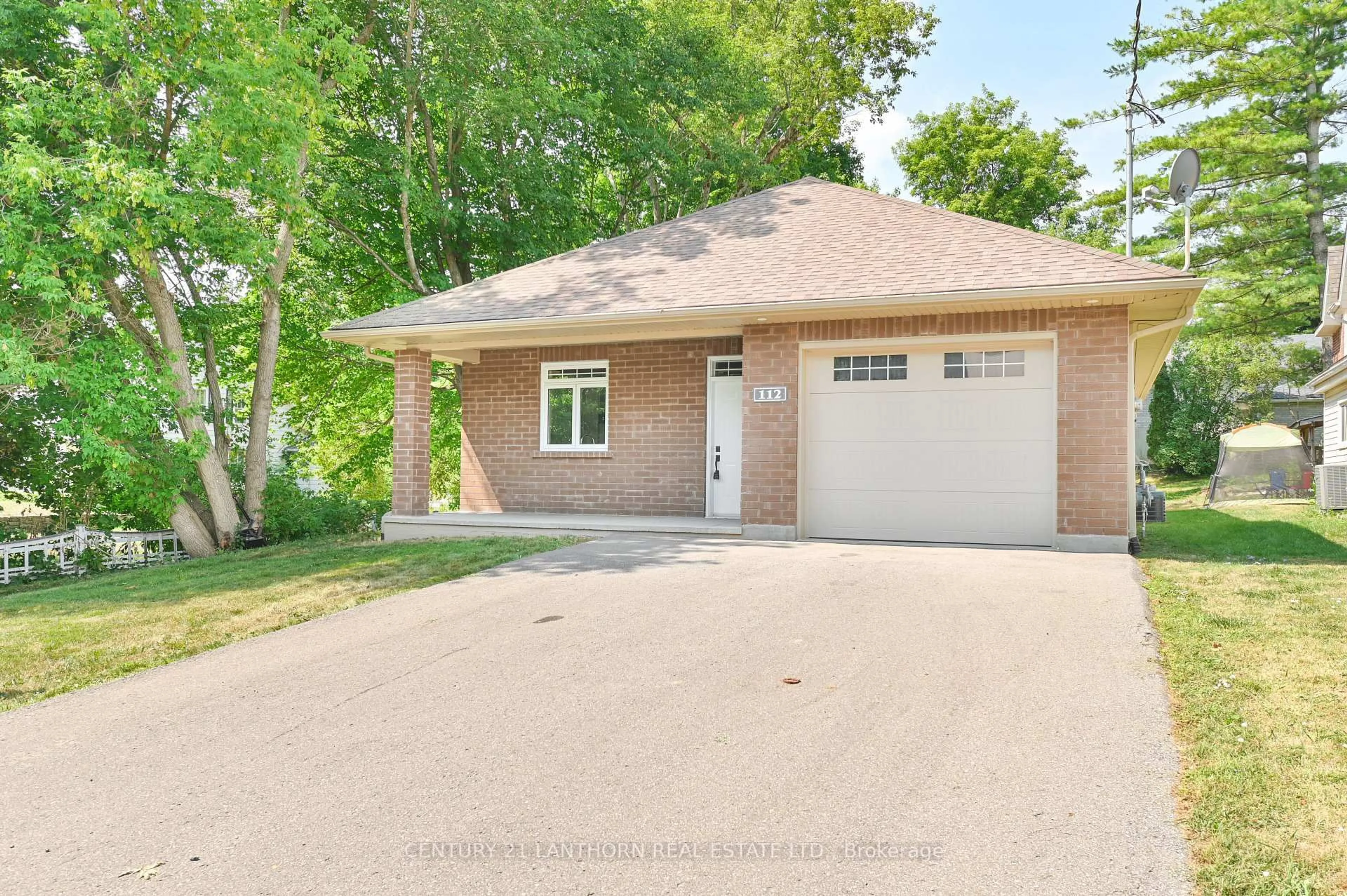 Home with brick exterior material, street for 112 Rollins St, Madoc Ontario K0K 2K0
