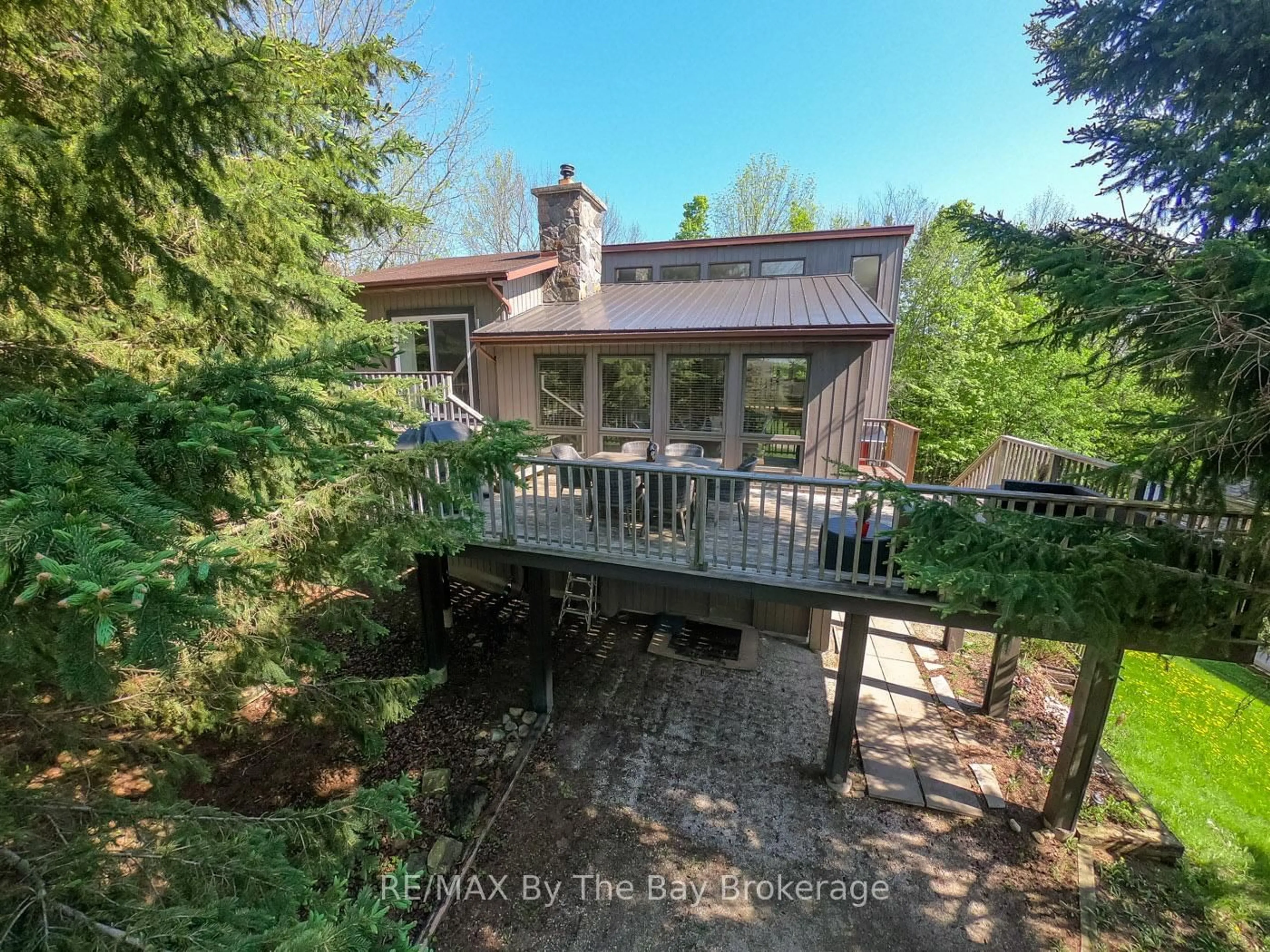 A pic from outside/outdoor area/front of a property/back of a property/a pic from drone, forest/trees view for 177 Talisman Mountain Dr, Grey Highlands Ontario N0C 1G0