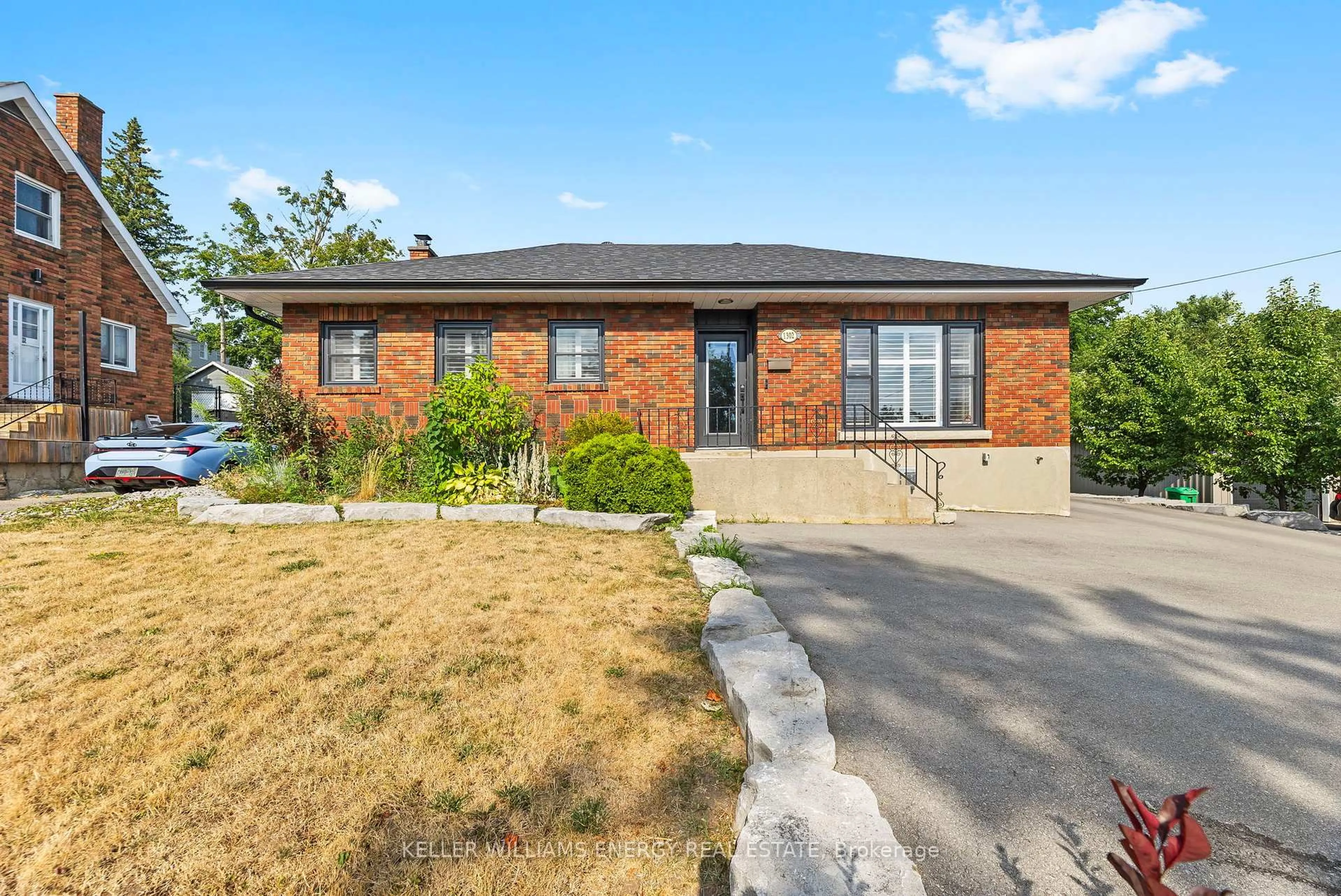 Home with brick exterior material, street for 1302 Dobbin Ave, Peterborough Central Ontario K9J 6A8