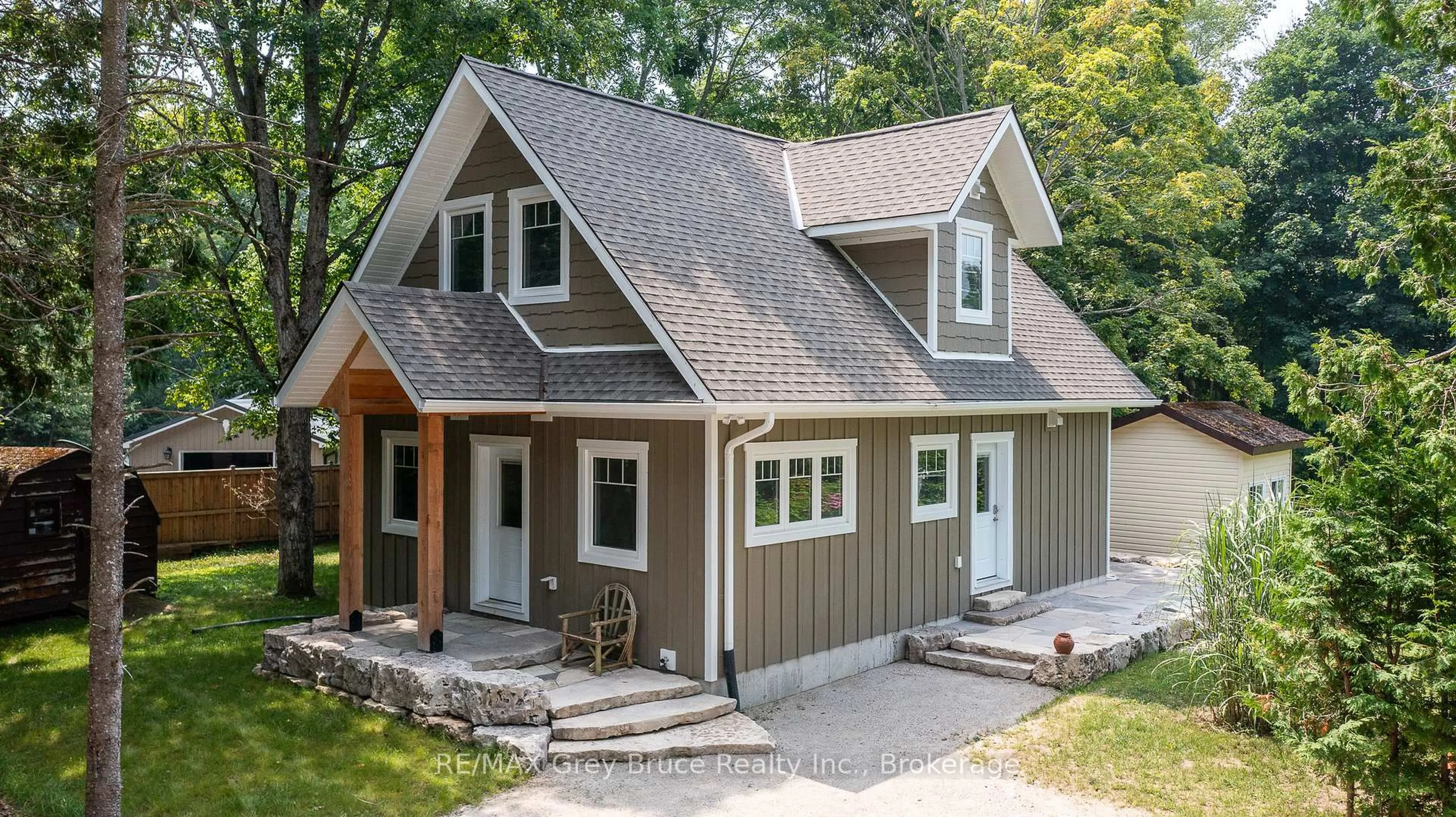 Home with vinyl exterior material, street for 457 Huron Rd Rd, South Bruce Peninsula Ontario N0H 2T0
