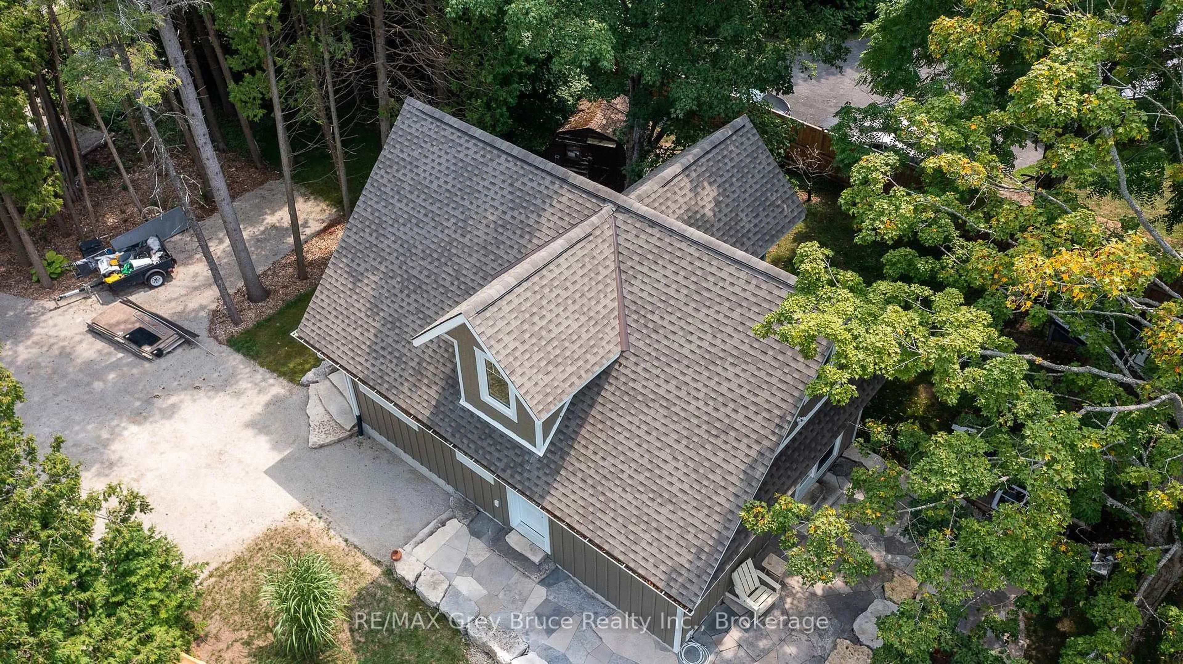 A pic from outside/outdoor area/front of a property/back of a property/a pic from drone, street for 457 Huron Rd Rd, South Bruce Peninsula Ontario N0H 2T0