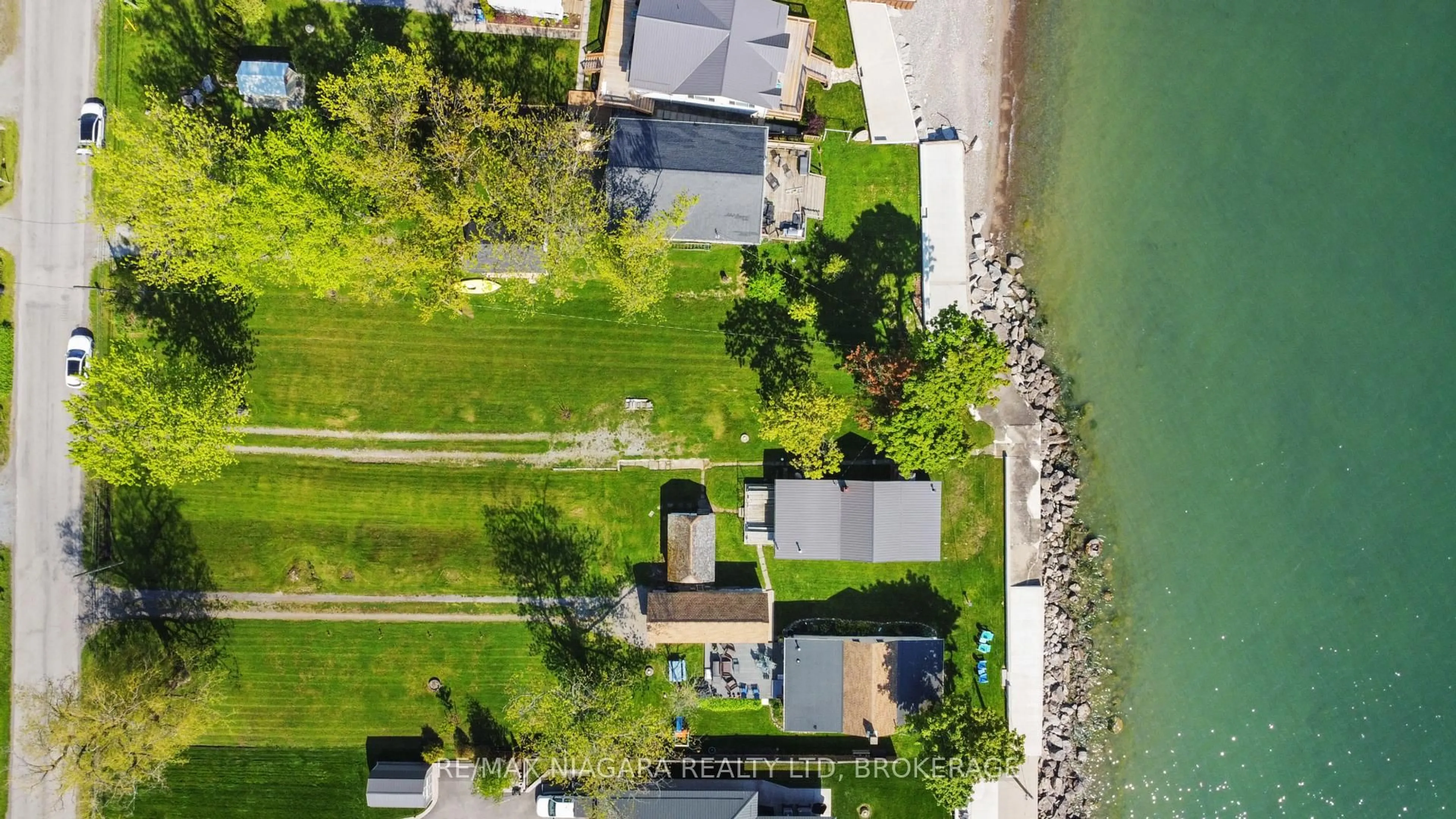 A pic from outside/outdoor area/front of a property/back of a property/a pic from drone, water/lake/river/ocean view for 10953 LAKESHORE Rd, Wainfleet Ontario L3K 5V4