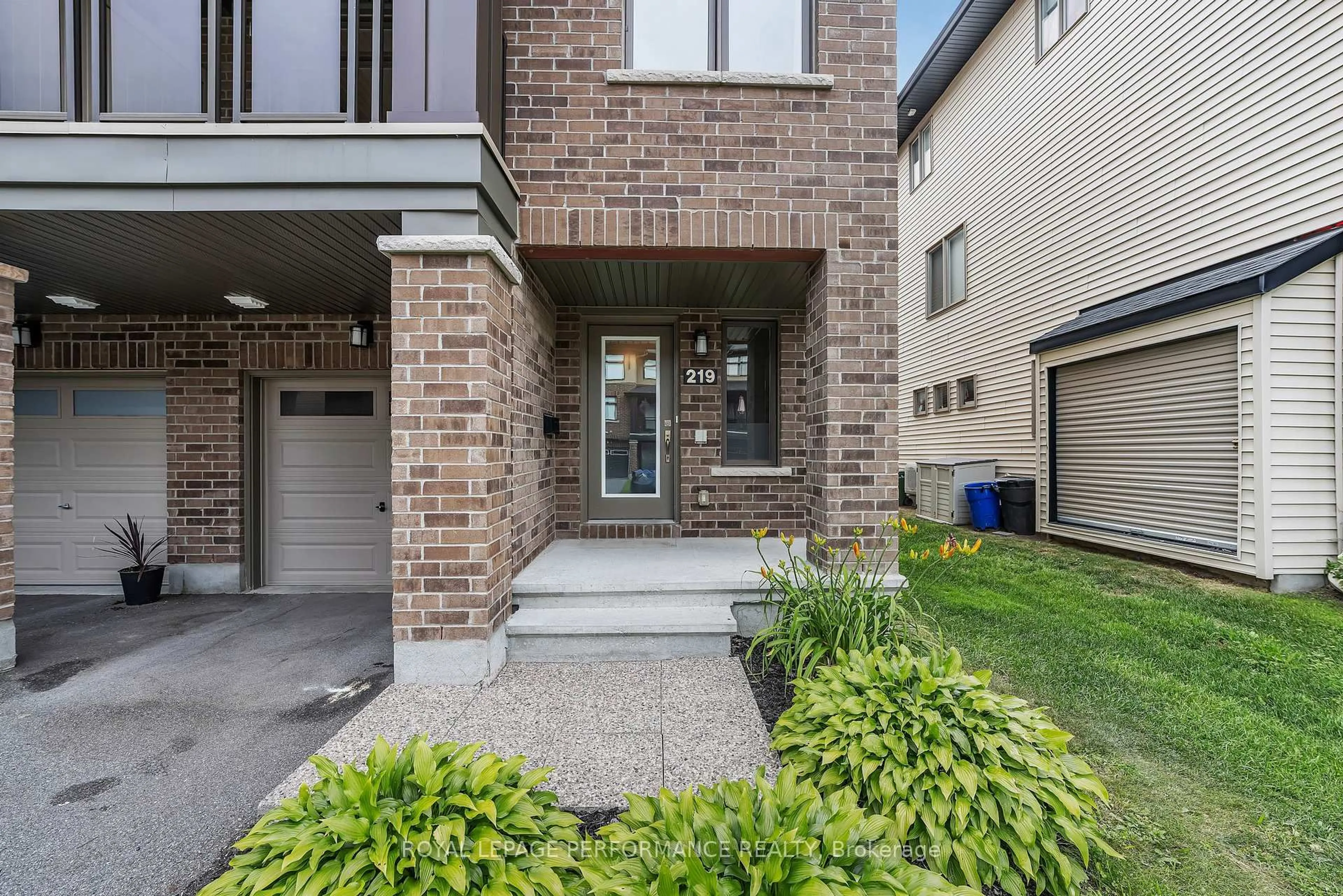Home with brick exterior material, street for 219 Dragonfly Walk, Ottawa Ontario K1W 0K3