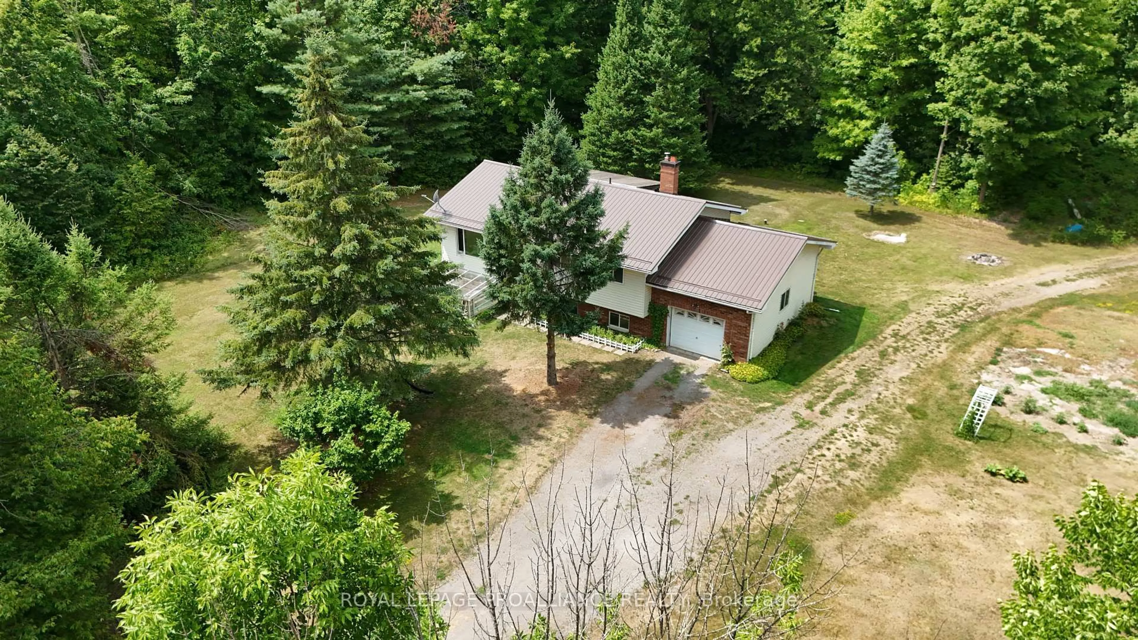 A pic from outside/outdoor area/front of a property/back of a property/a pic from drone, forest/trees view for 2201 Moneymore Rd, Belleville Ontario K0K 2Y0