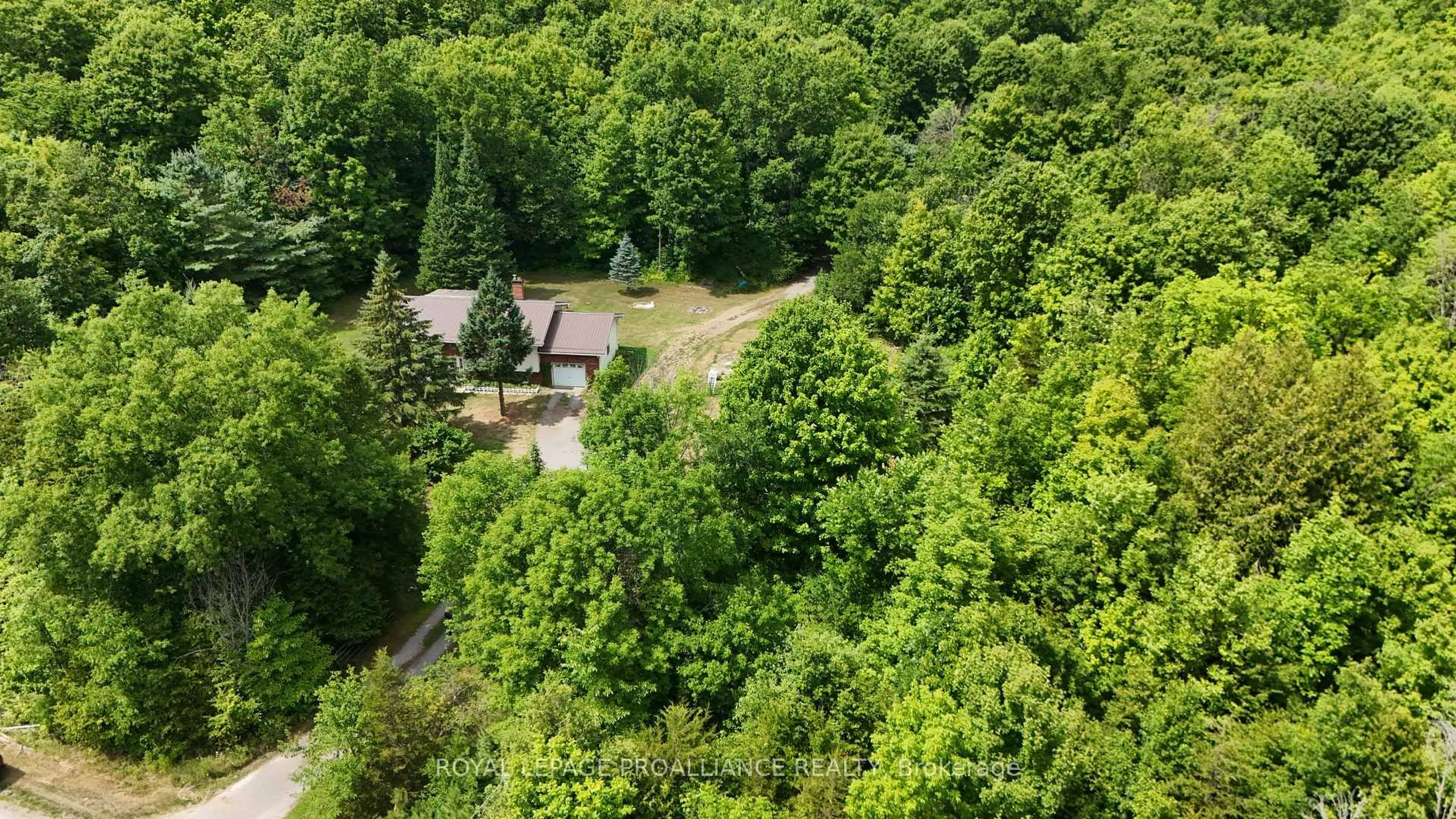 A pic from outside/outdoor area/front of a property/back of a property/a pic from drone, forest/trees view for 2201 Moneymore Rd, Belleville Ontario K0K 2Y0