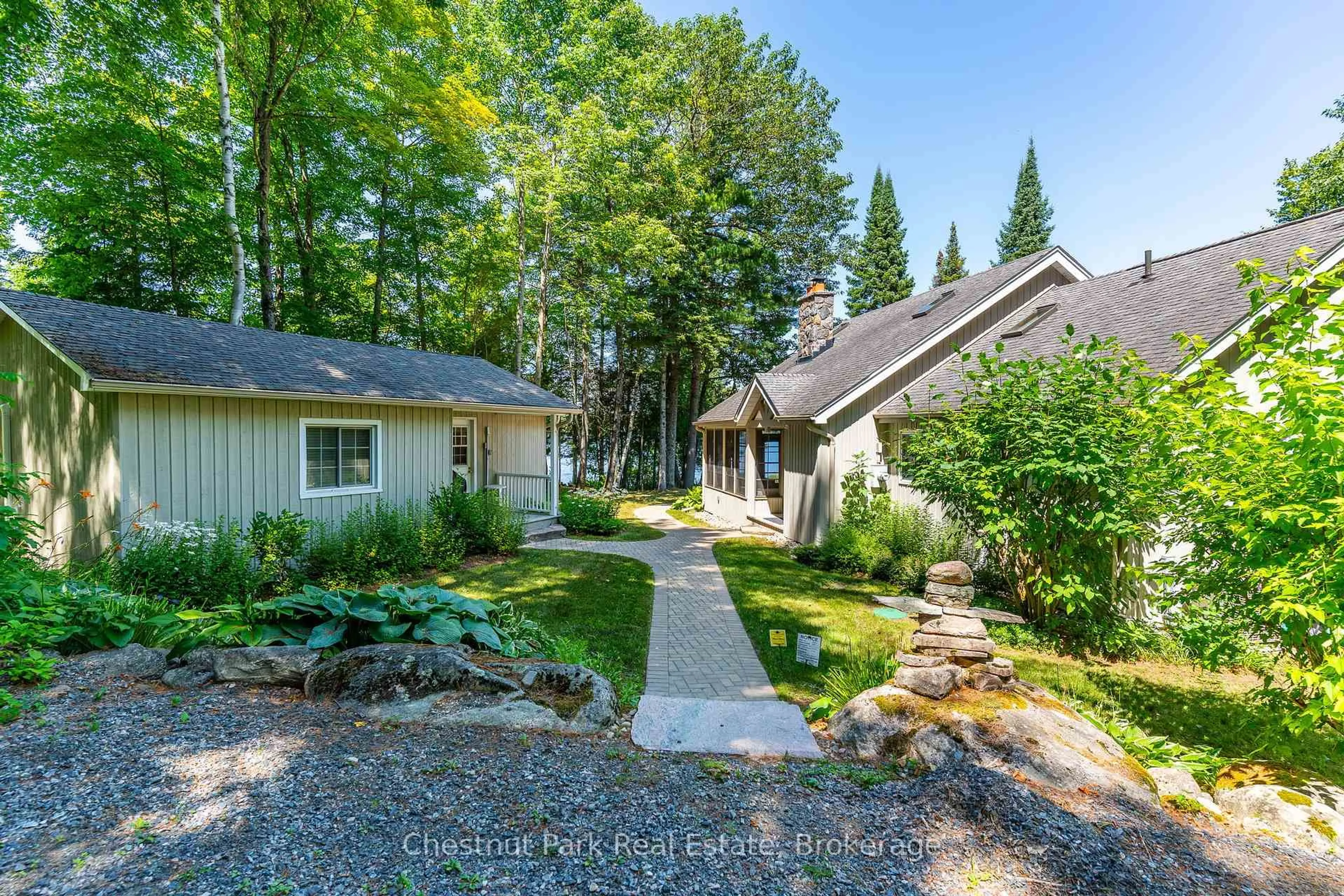 A pic from outside/outdoor area/front of a property/back of a property/a pic from drone, forest/trees view for 1142 Mccracken's Lane, Minden Hills Ontario K0M 2K0