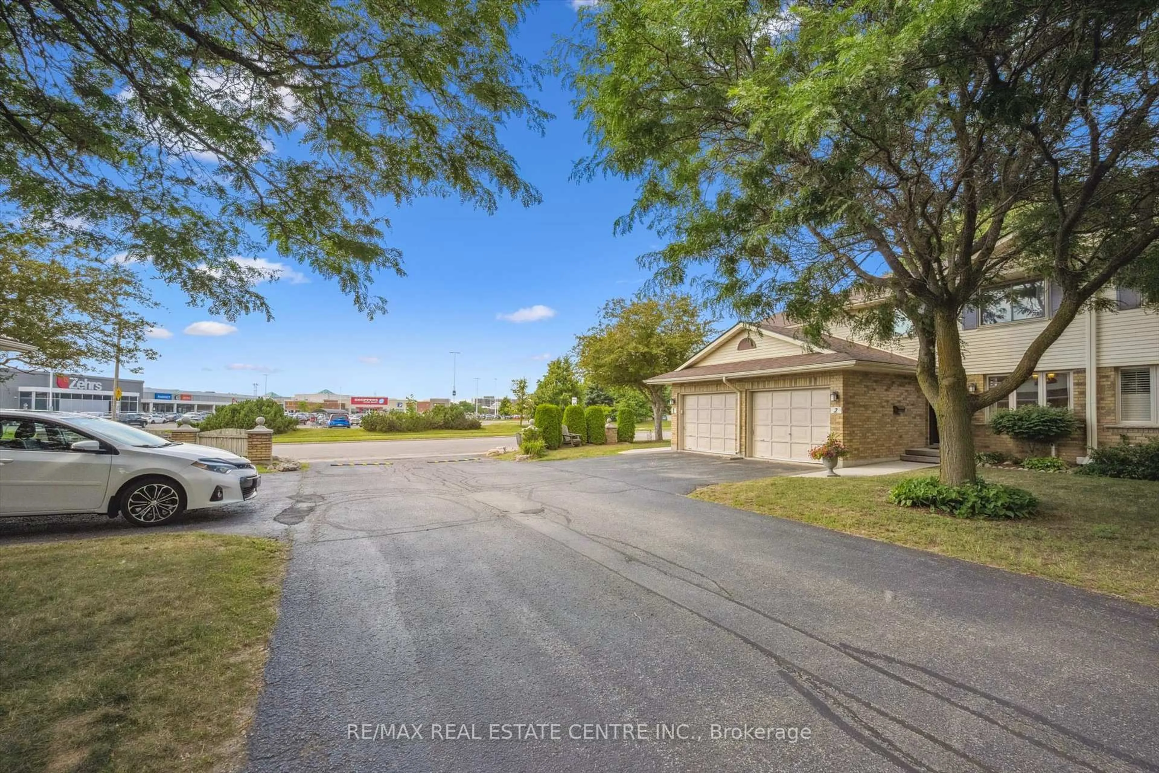 A pic from outside/outdoor area/front of a property/back of a property/a pic from drone, water/lake/river/ocean view for 375 Kingscourt Dr #2, Waterloo Ontario N2K 3N7