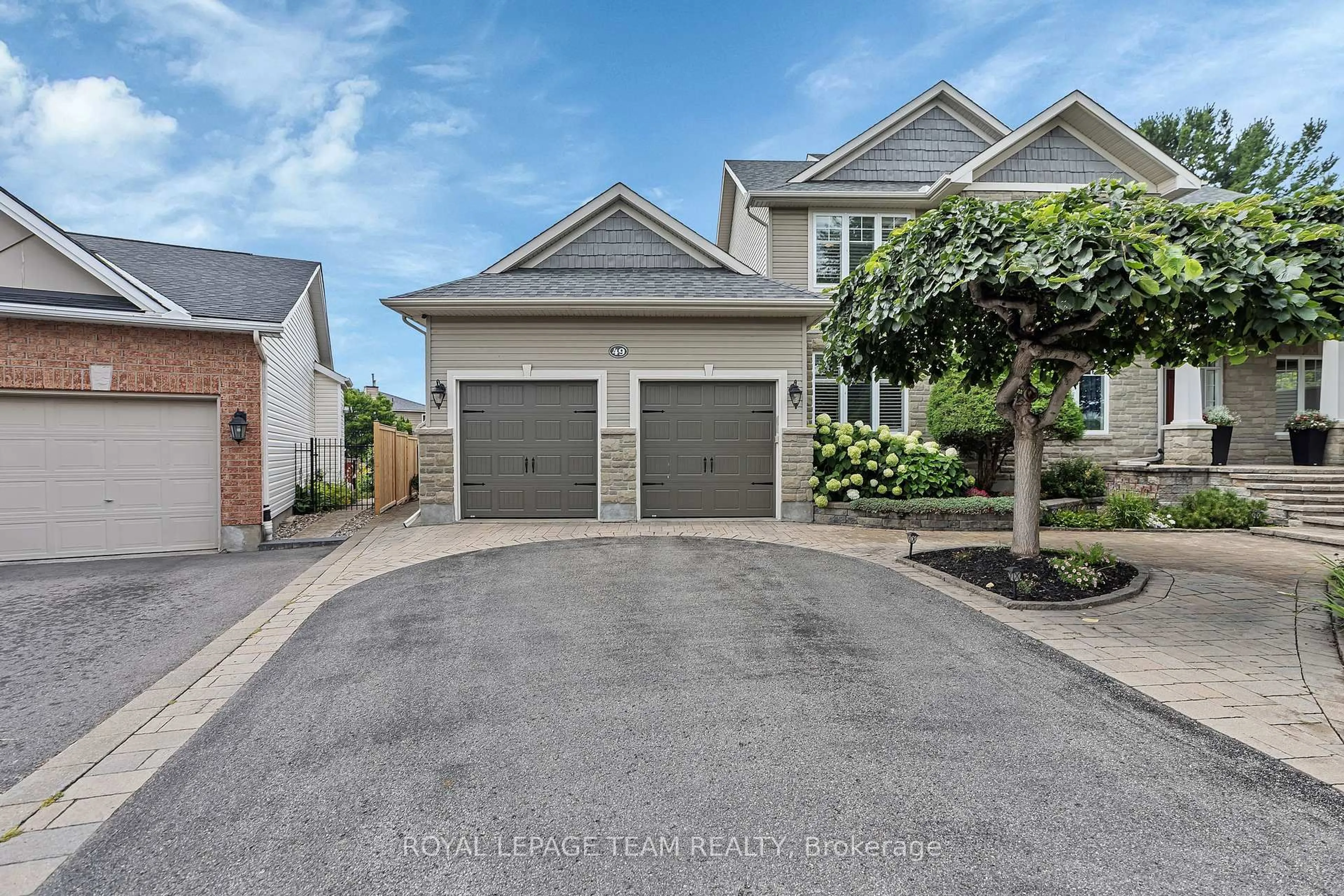 A pic from outside/outdoor area/front of a property/back of a property/a pic from drone, street for 49 Shining Star Circ, Ottawa Ontario K2S 2B4