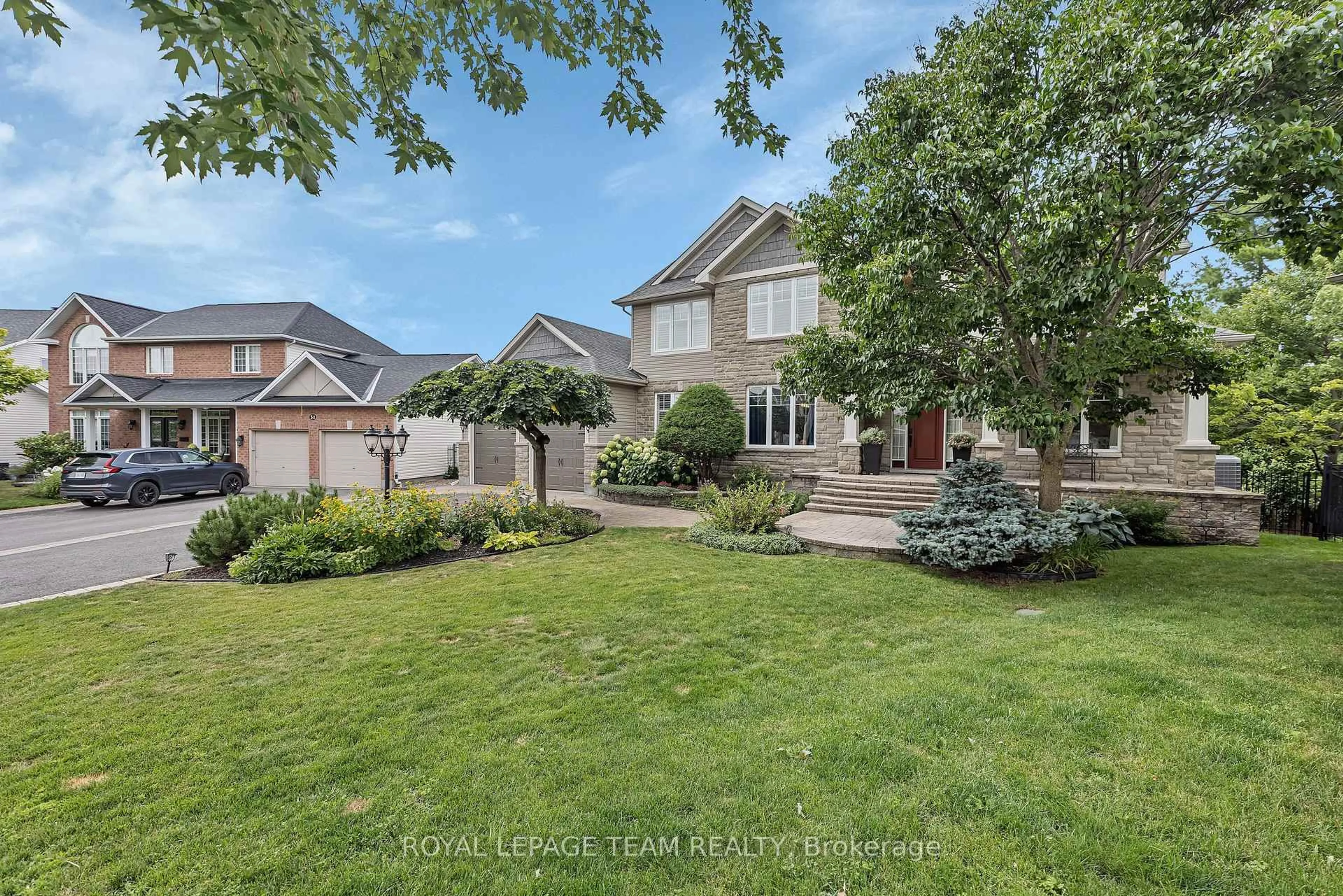 A pic from outside/outdoor area/front of a property/back of a property/a pic from drone, street for 49 Shining Star Circ, Ottawa Ontario K2S 2B4