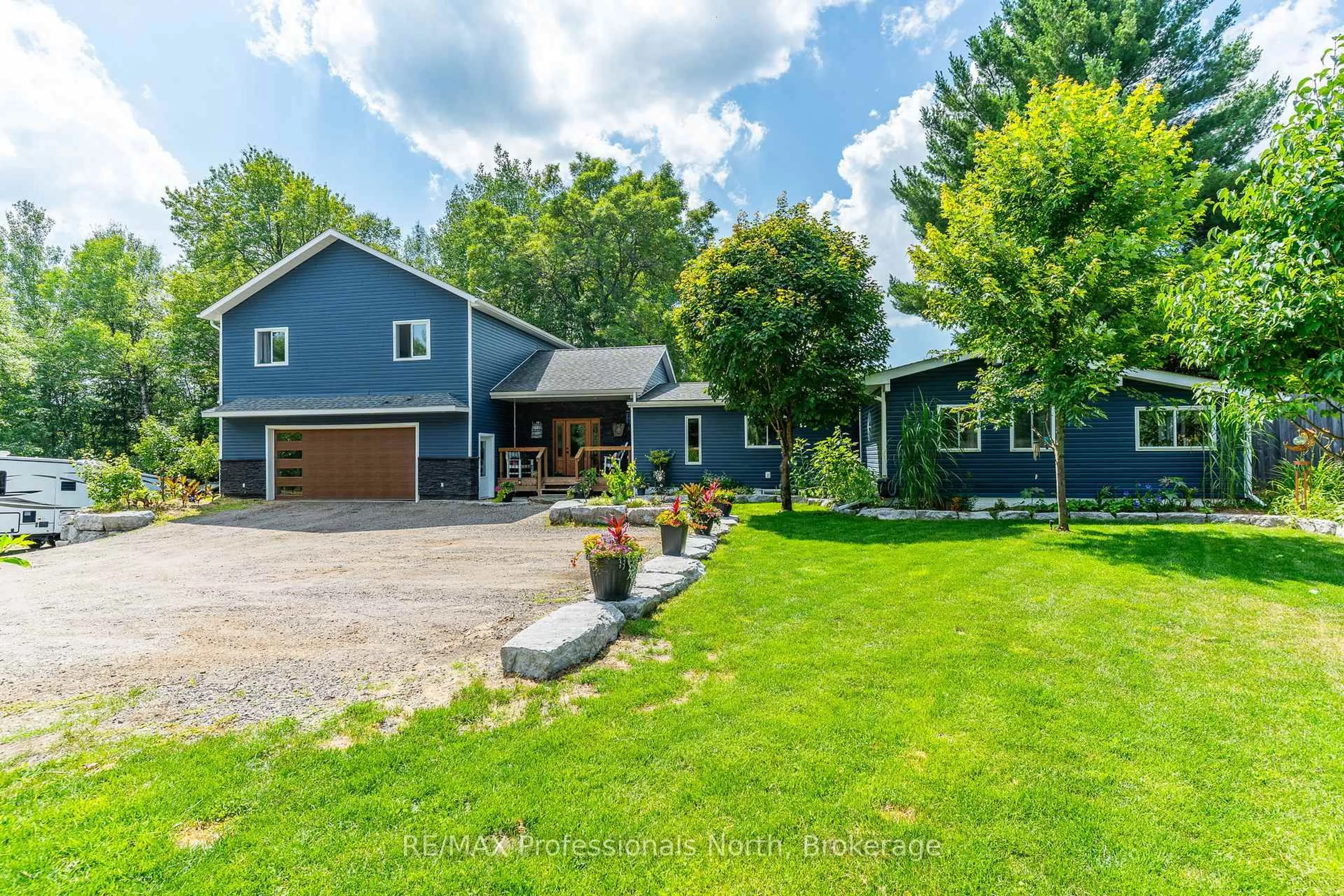 A pic from outside/outdoor area/front of a property/back of a property/a pic from drone, unknown for 1030 ALL SEASONS Crt, Algonquin Highlands Ontario K0M 1S0