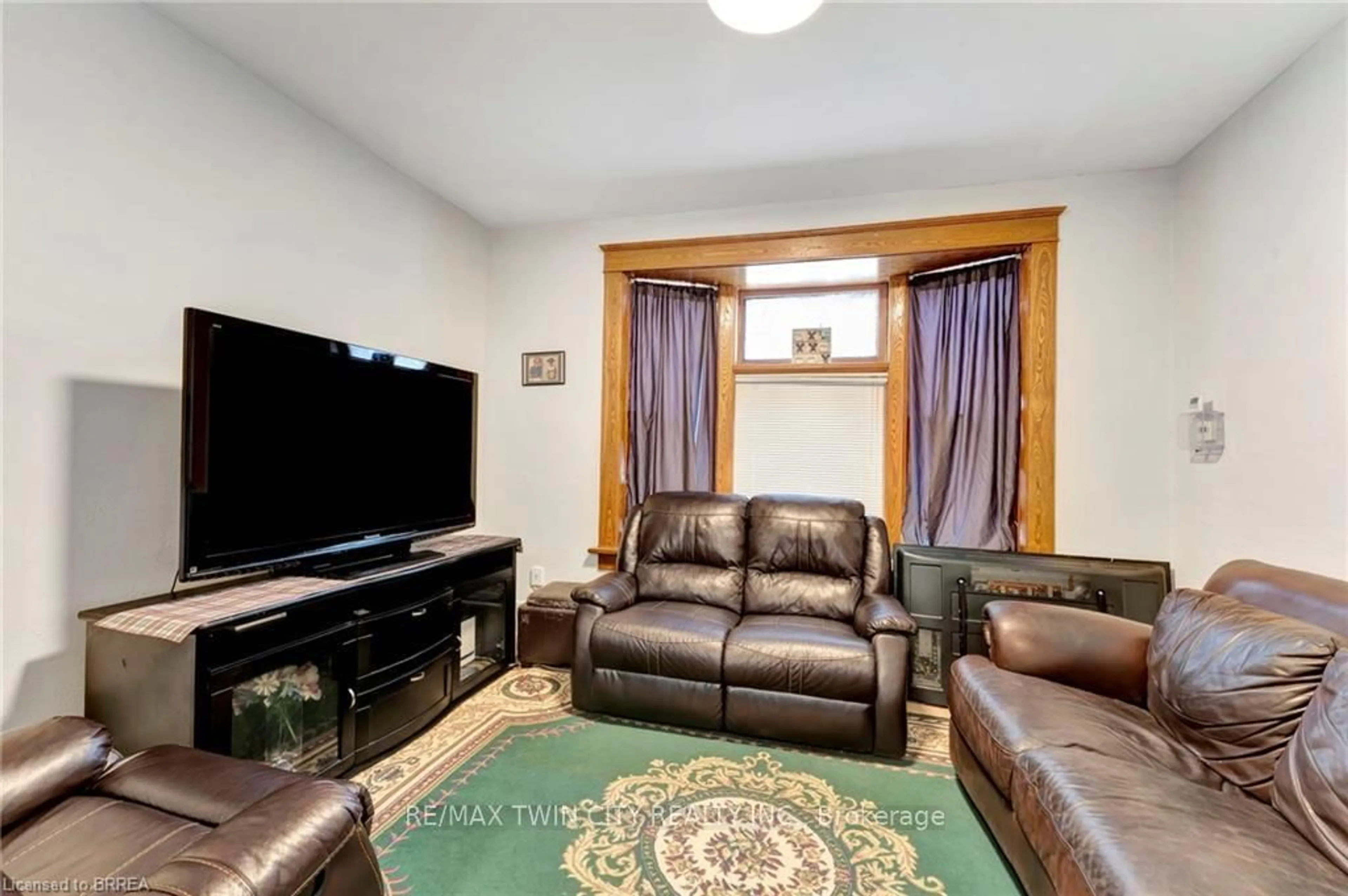Living room with furniture, unknown for 14-20 Brubacher St, Kitchener Ontario N2H 2V9