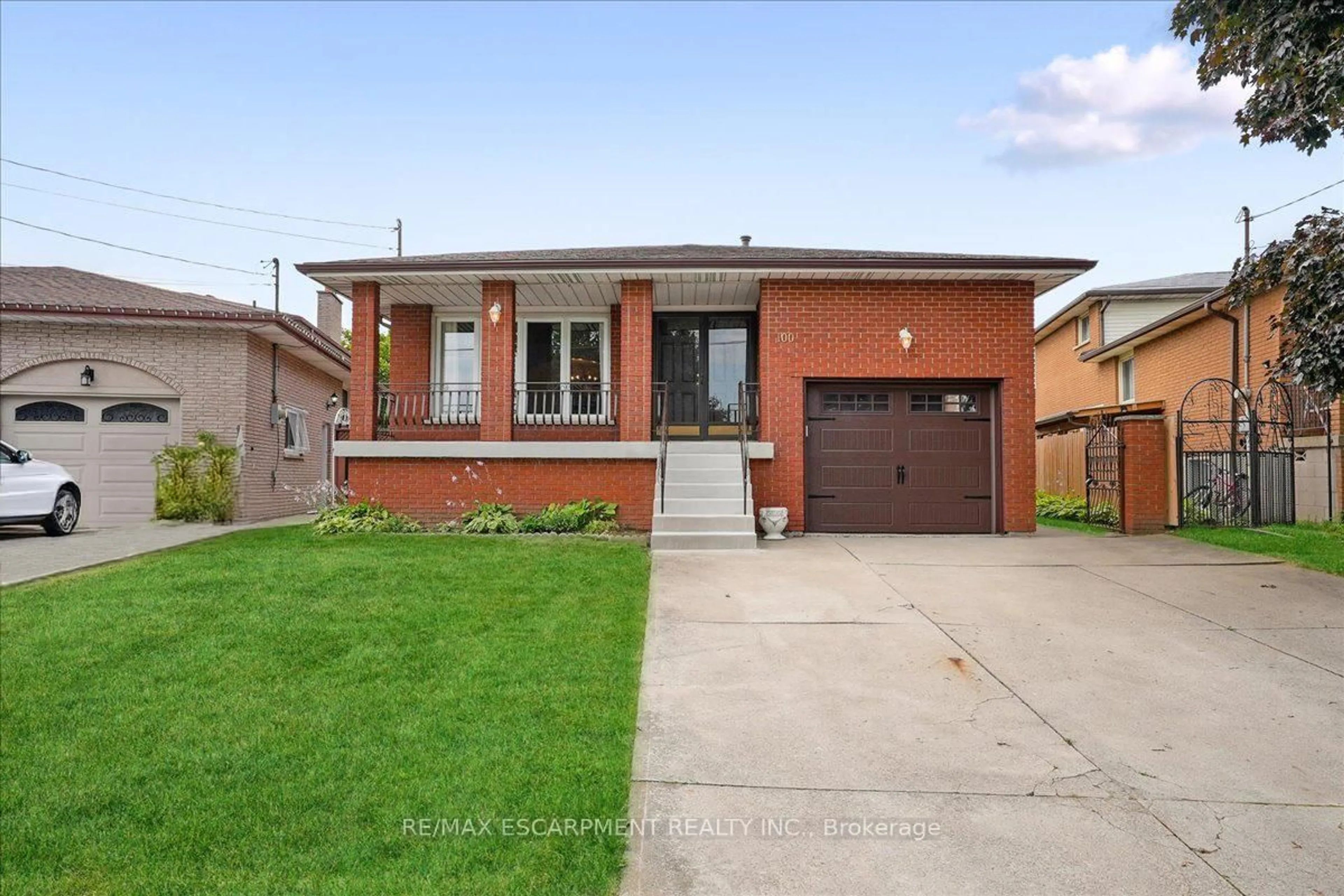 Home with brick exterior material, street for 100 Taymall St, Hamilton Ontario L8W 1Z4