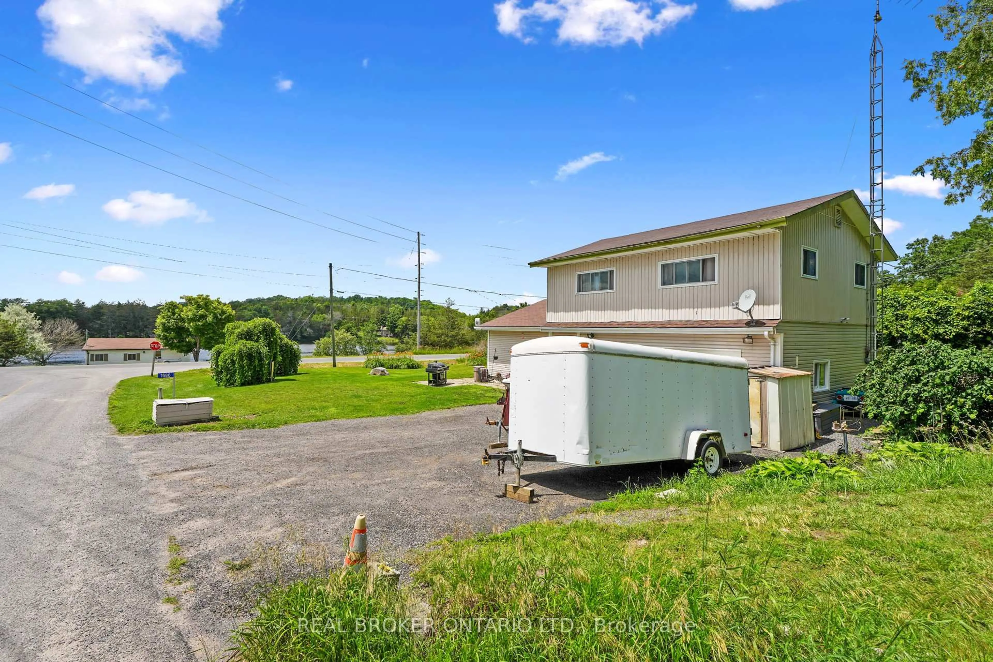 A pic from outside/outdoor area/front of a property/back of a property/a pic from drone, water/lake/river/ocean view for 1686 8th Line, Trent Hills Ontario K0L 1L0