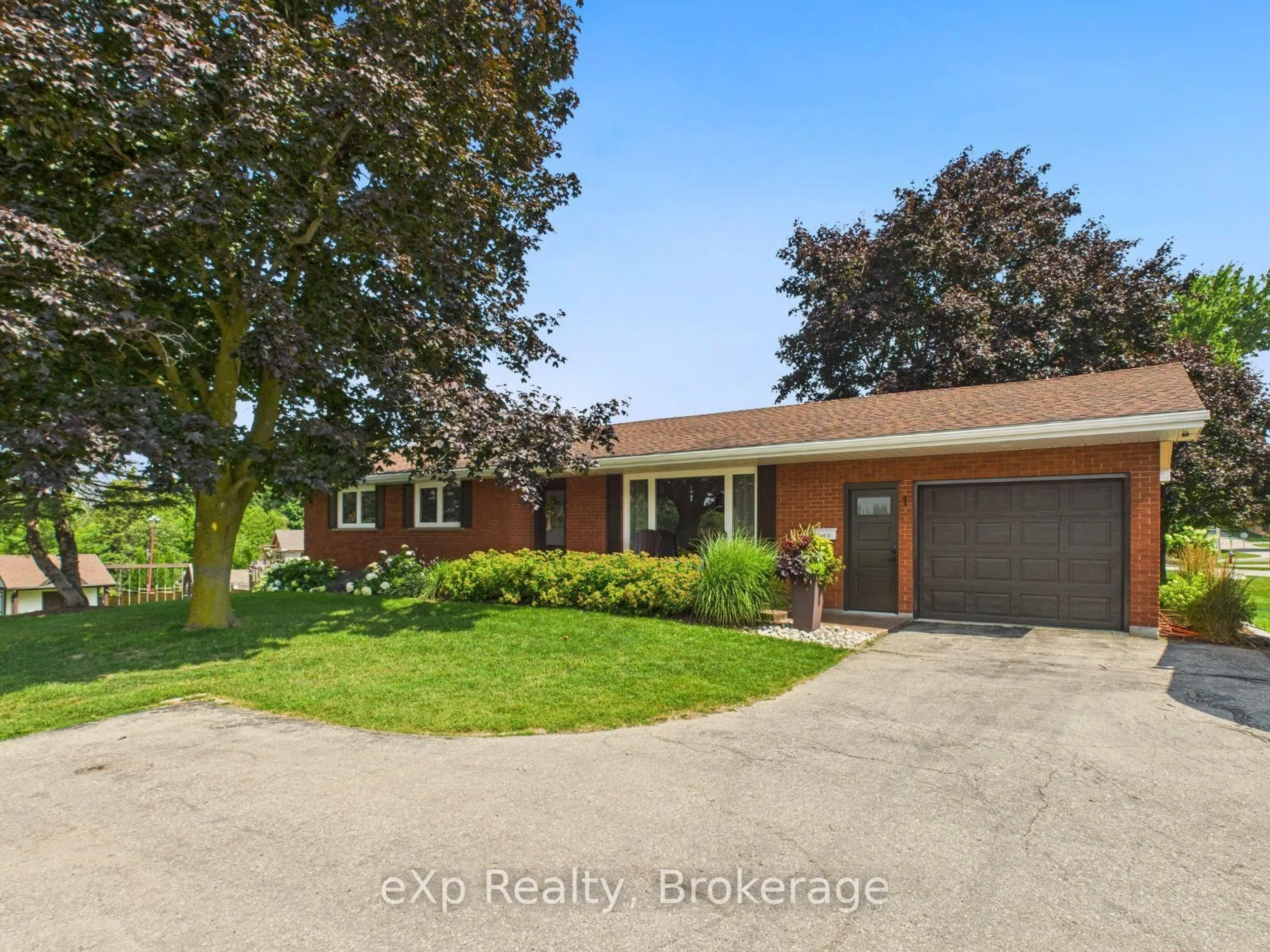 A pic from outside/outdoor area/front of a property/back of a property/a pic from drone, street for 1 Clark St, South Bruce Ontario N0G 2J0