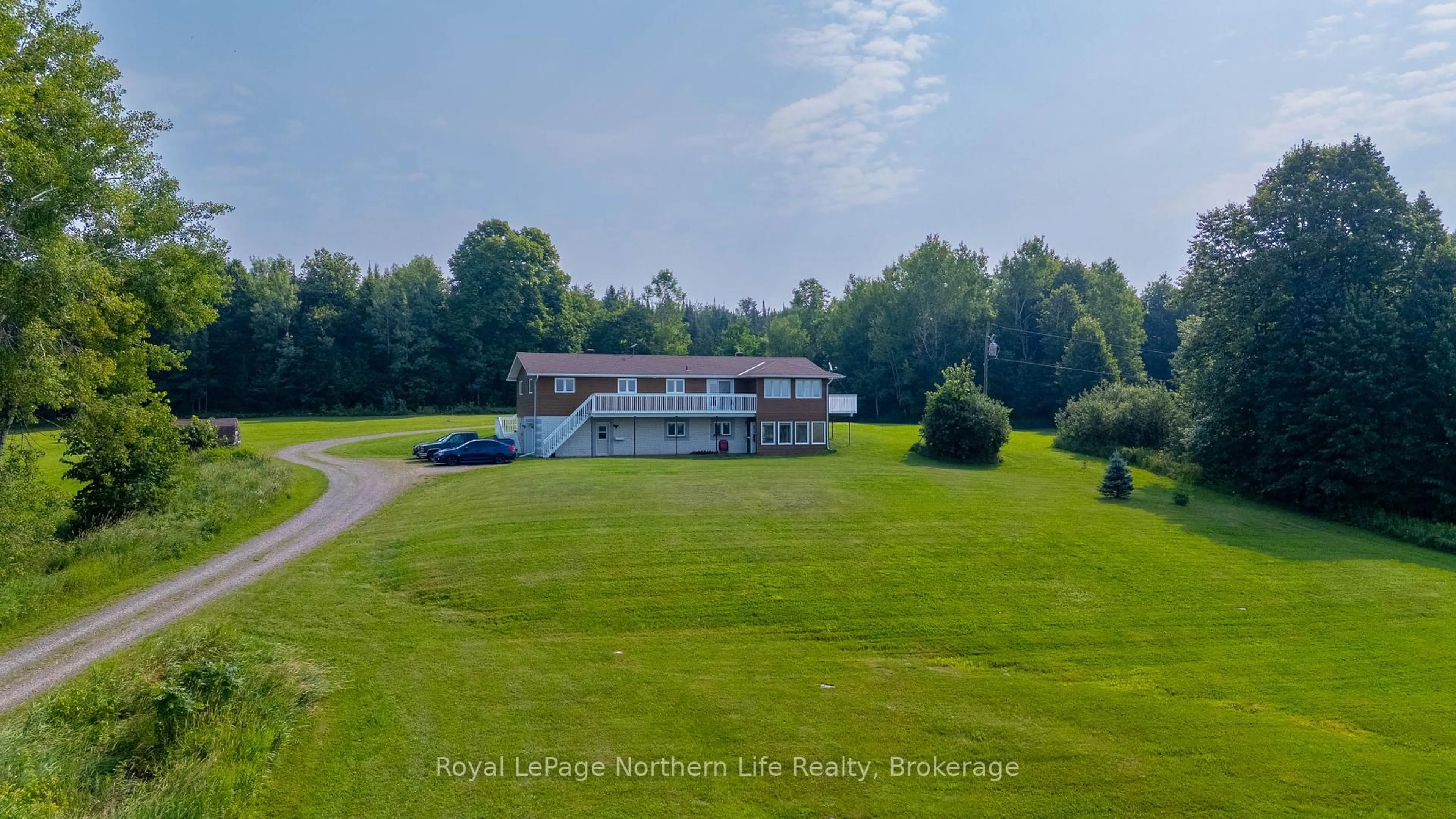 A pic from outside/outdoor area/front of a property/back of a property/a pic from drone, water/lake/river/ocean view for 13 Sunnyside Rd, Bonfield Ontario P0H 1K0