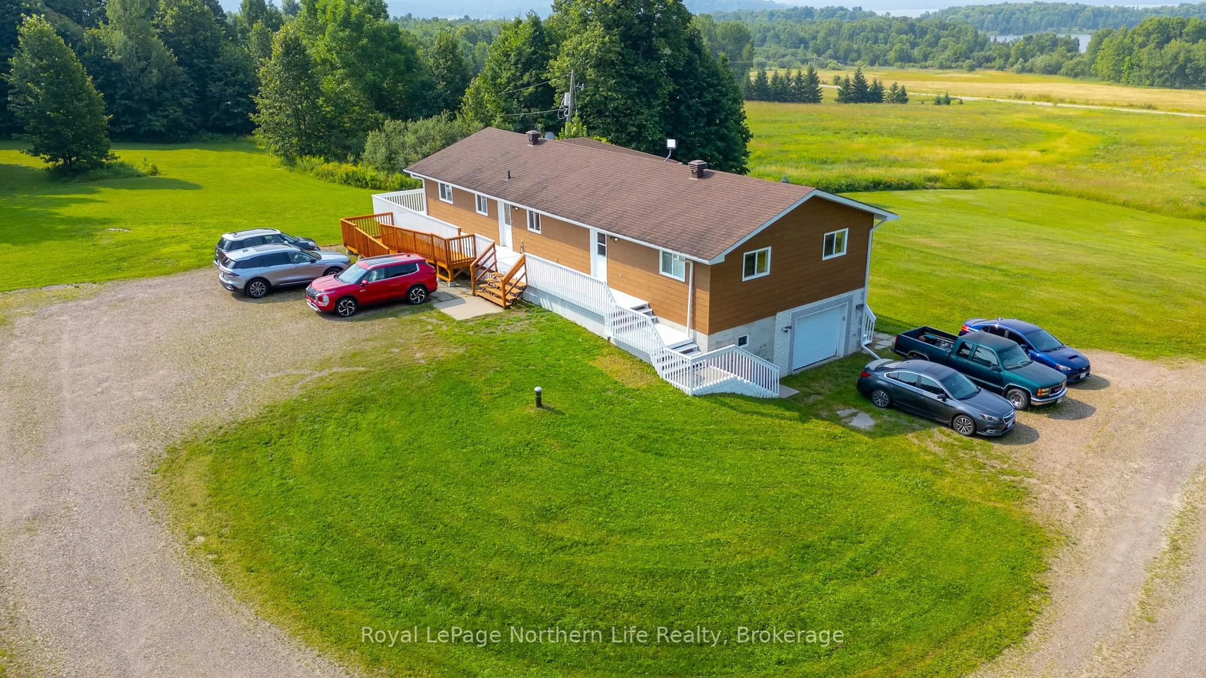 A pic from outside/outdoor area/front of a property/back of a property/a pic from drone, building for 13 Sunnyside Rd, Bonfield Ontario P0H 1K0