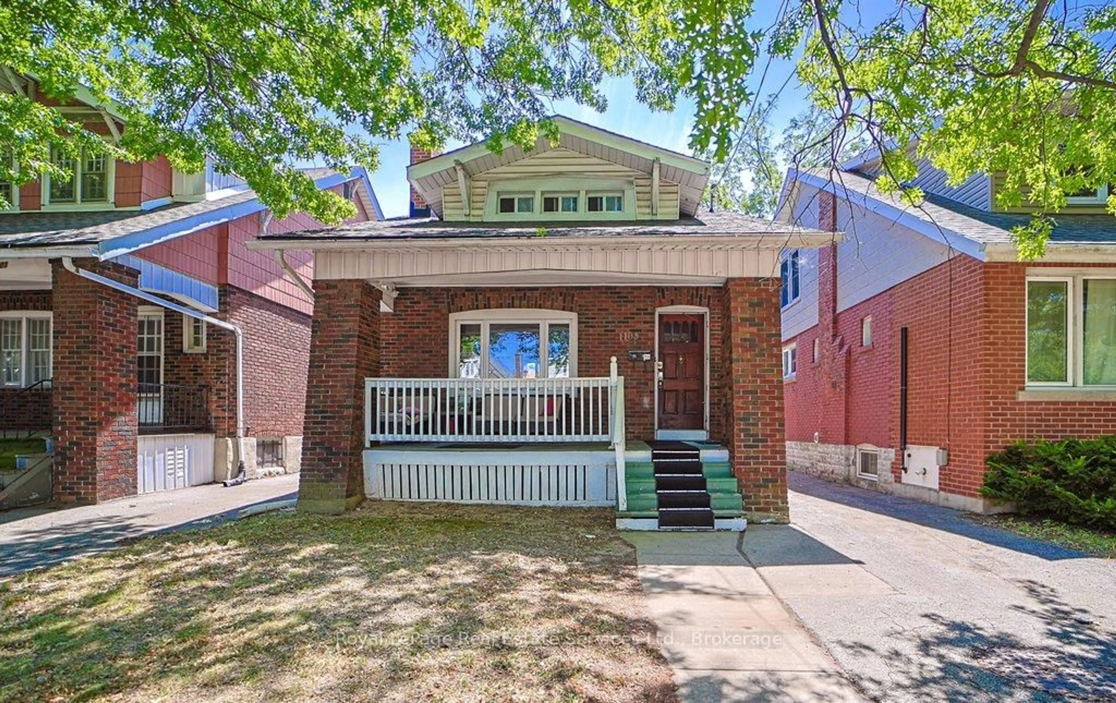 Home with brick exterior material, street for 1105 King St, Hamilton Ontario L8S 1L8