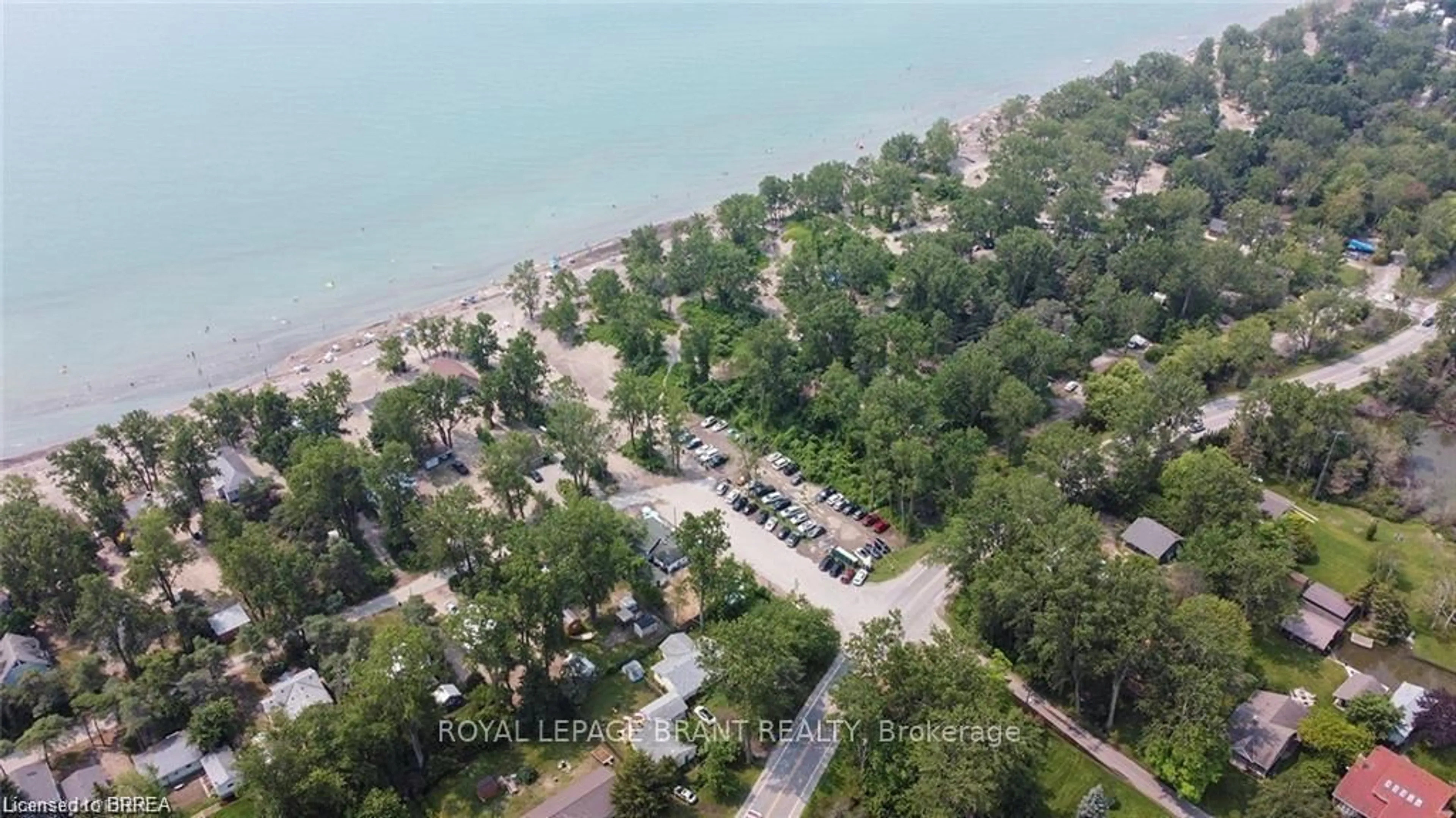 A pic from outside/outdoor area/front of a property/back of a property/a pic from drone, water/lake/river/ocean view for 57 Erie Blvd, Norfolk Ontario N0E 1M0