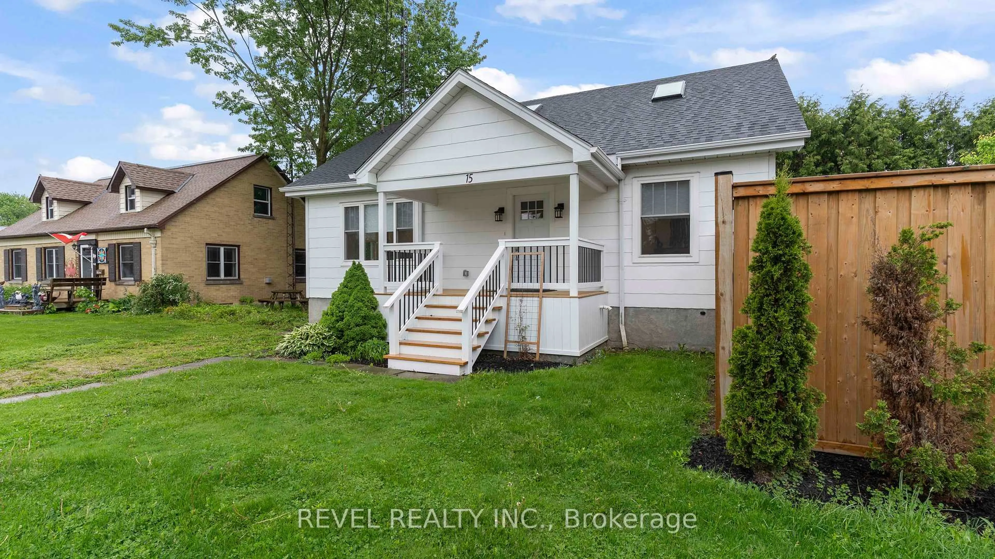 Home with vinyl exterior material, street for 15 Victoria Ave, South Huron Ontario N0M 1M0