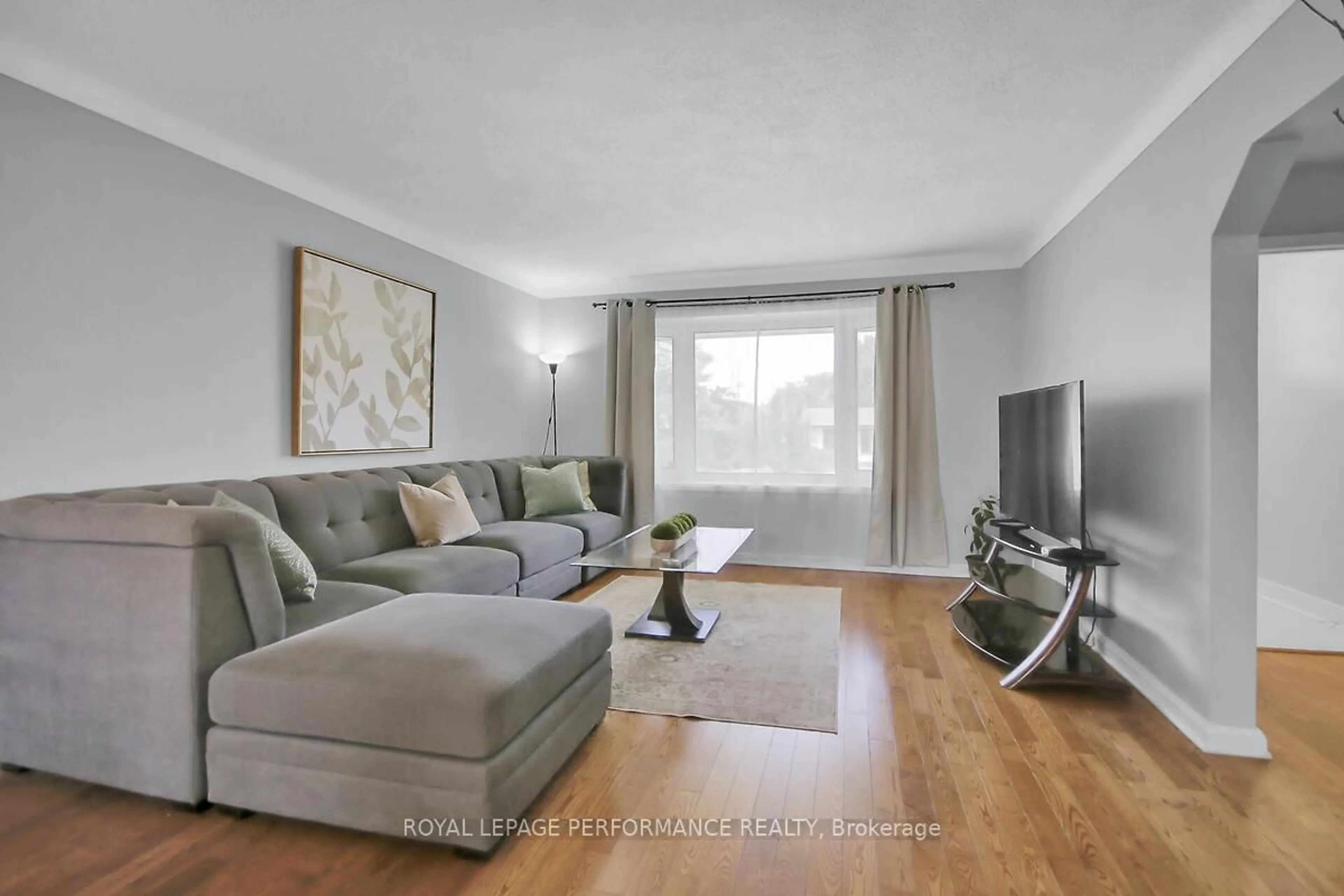Living room with furniture, wood/laminate floor for 6 Twin Terr, Ottawa Ontario K2E 5E4