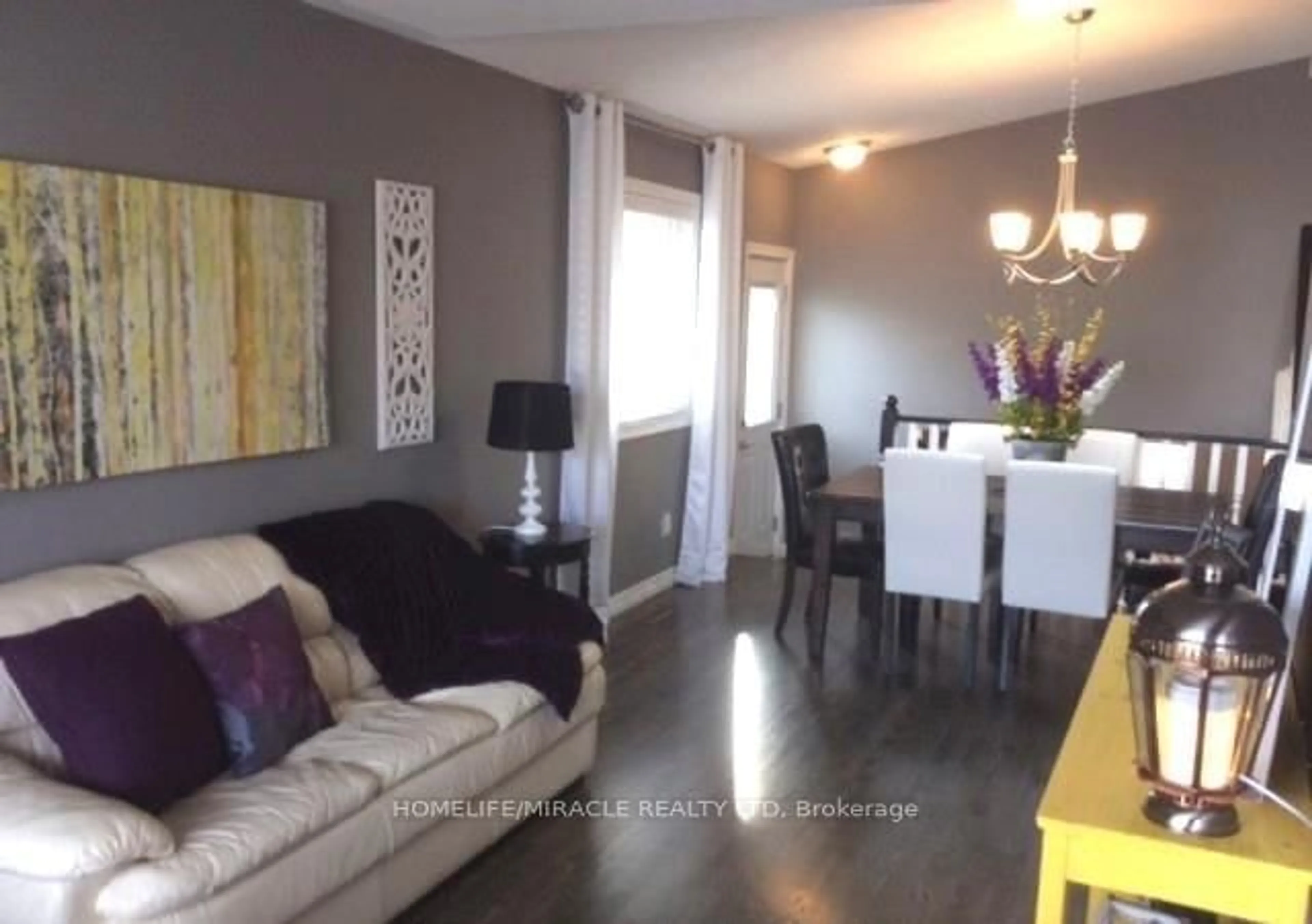 Living room with furniture, wood/laminate floor for 120 Ashbury Ave, London South Ontario N6E 1T1