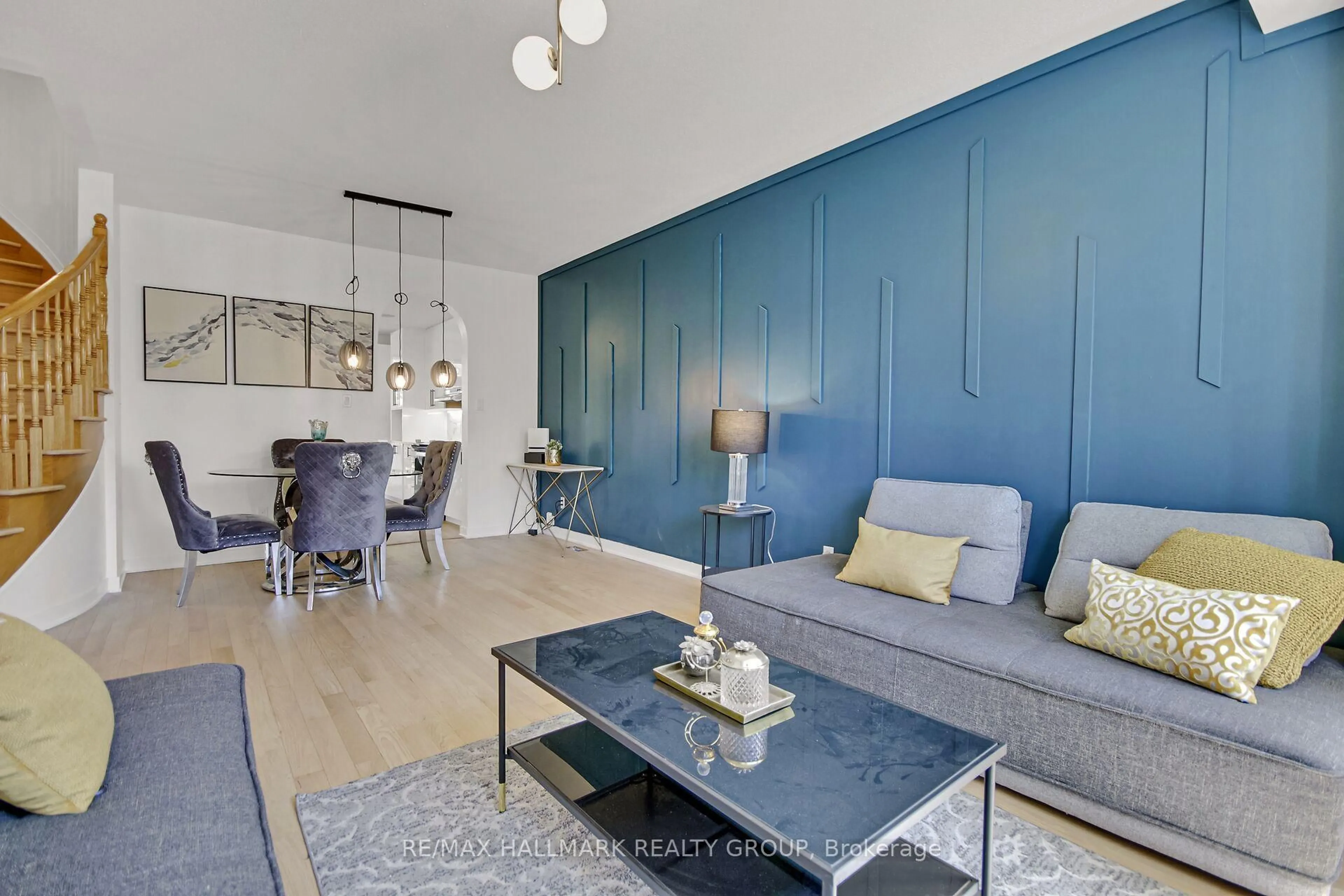 Living room with furniture, wood/laminate floor for 206 Annapolis Circ, Ottawa Ontario K1V 1Y9