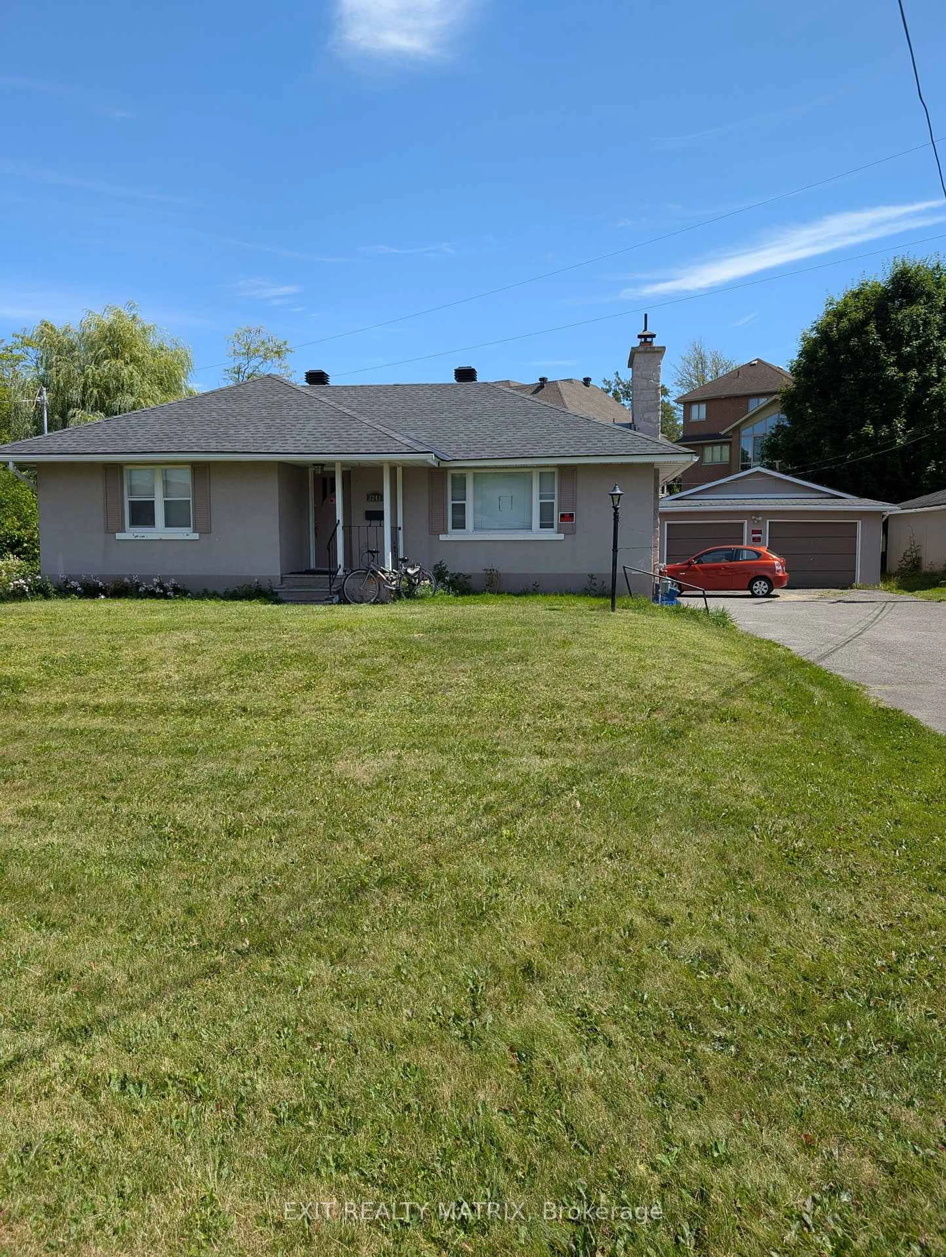 Home with vinyl exterior material, street for 3243 Riverside Dr, Ottawa Ontario K1V 8N8