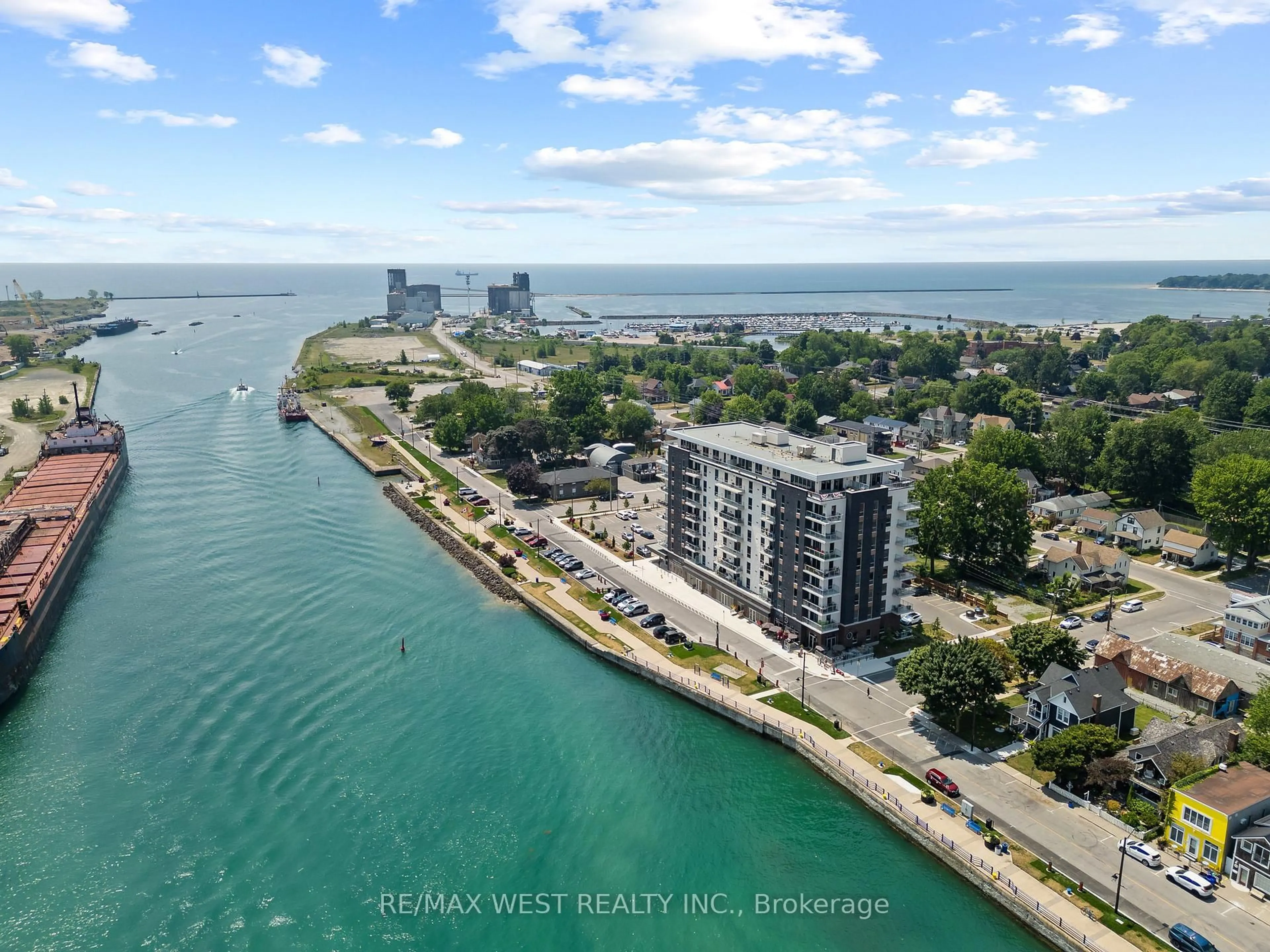 A pic from outside/outdoor area/front of a property/back of a property/a pic from drone, water/lake/river/ocean view for 118 West St #502, Port Colborne Ontario L3K 4C9