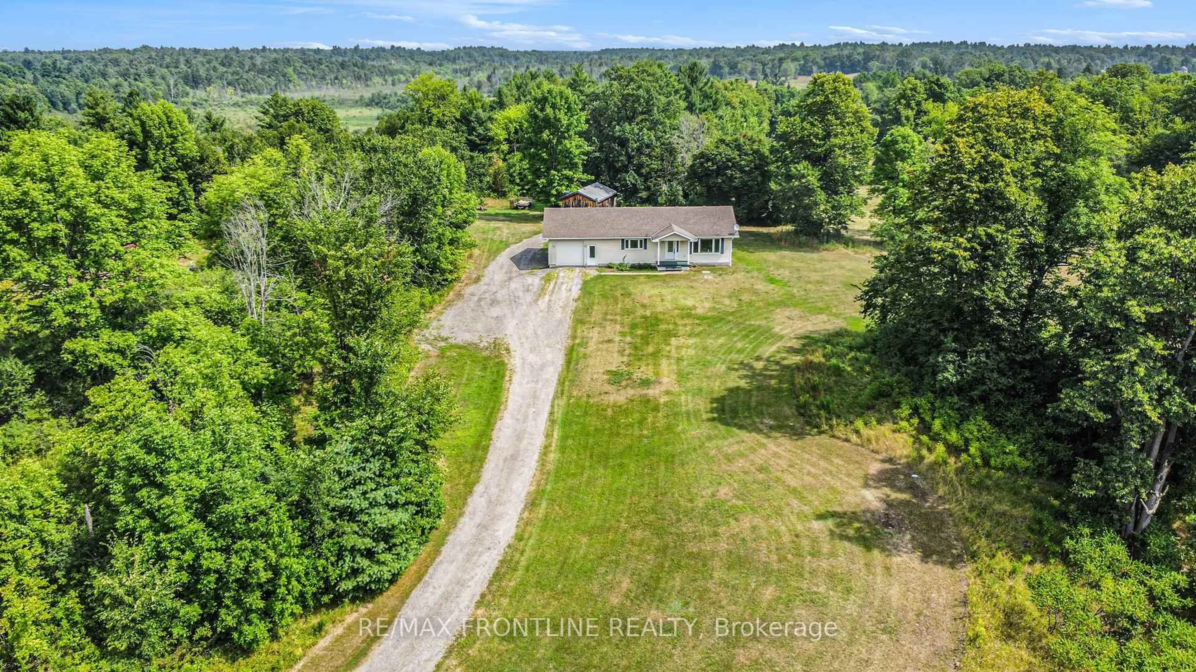 A pic from outside/outdoor area/front of a property/back of a property/a pic from drone, water/lake/river/ocean view for 20650 Hwy 7 Highway, Maberly Ontario K0H 2B0