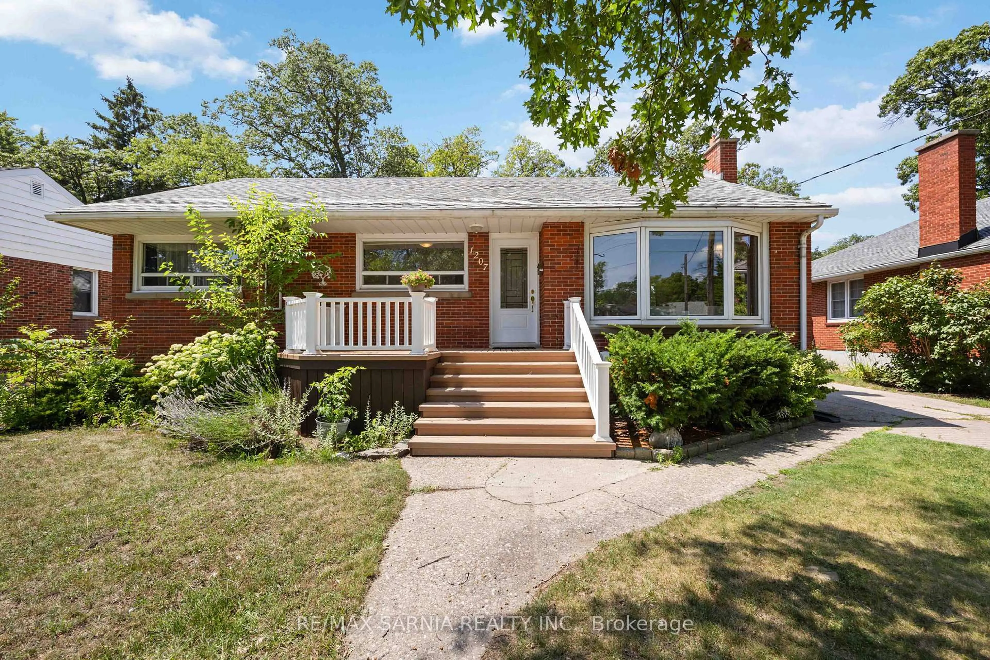 Home with brick exterior material, street for 1207 Colborne Rd, Sarnia Ontario N7V 3K9