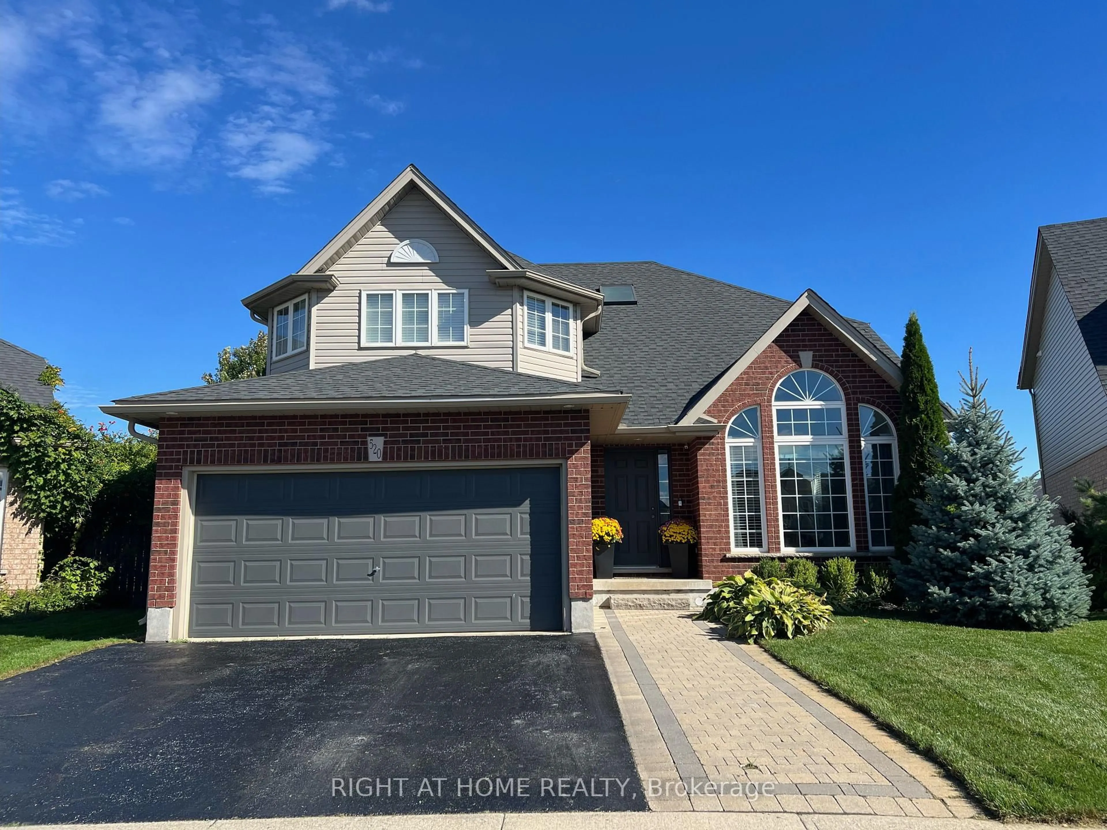Home with brick exterior material, street for 520 Pine Hollow Crt, Kitchener Ontario N2R 1T3