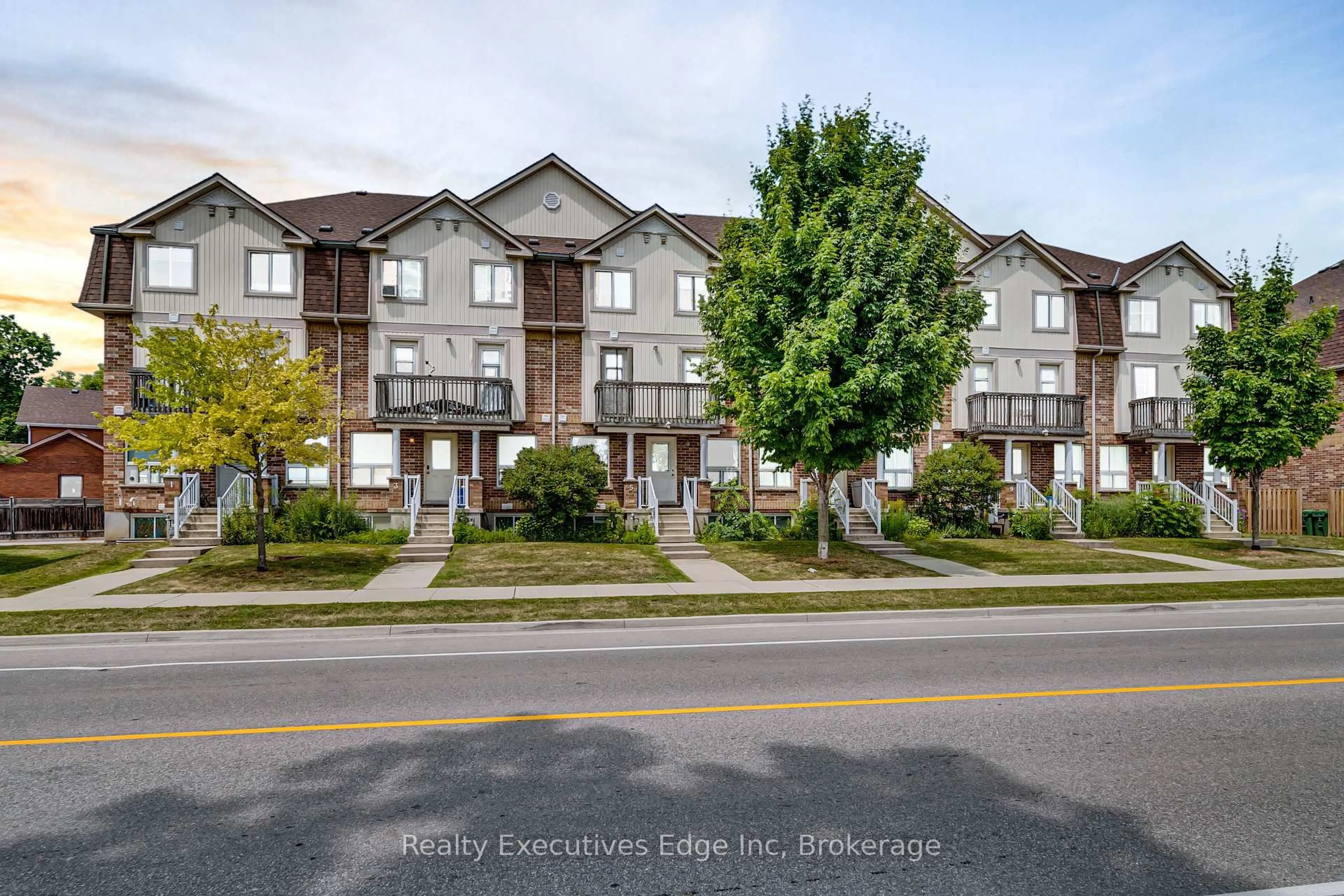 A pic from outside/outdoor area/front of a property/back of a property/a pic from drone, street for 142 York Rd #5, Guelph Ontario N1E 3E9