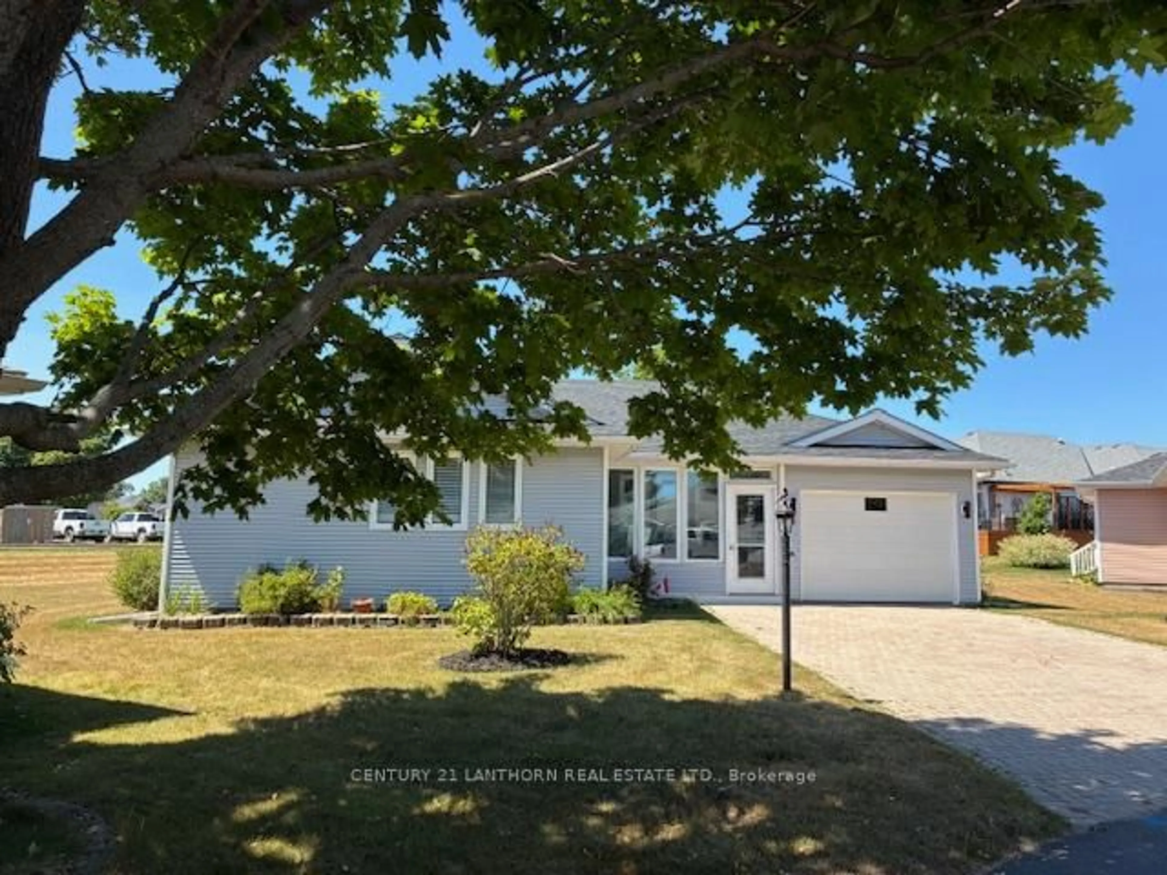 A pic from outside/outdoor area/front of a property/back of a property/a pic from drone, street for 8 Quaker Crt, Prince Edward County Ontario K0K 3L0