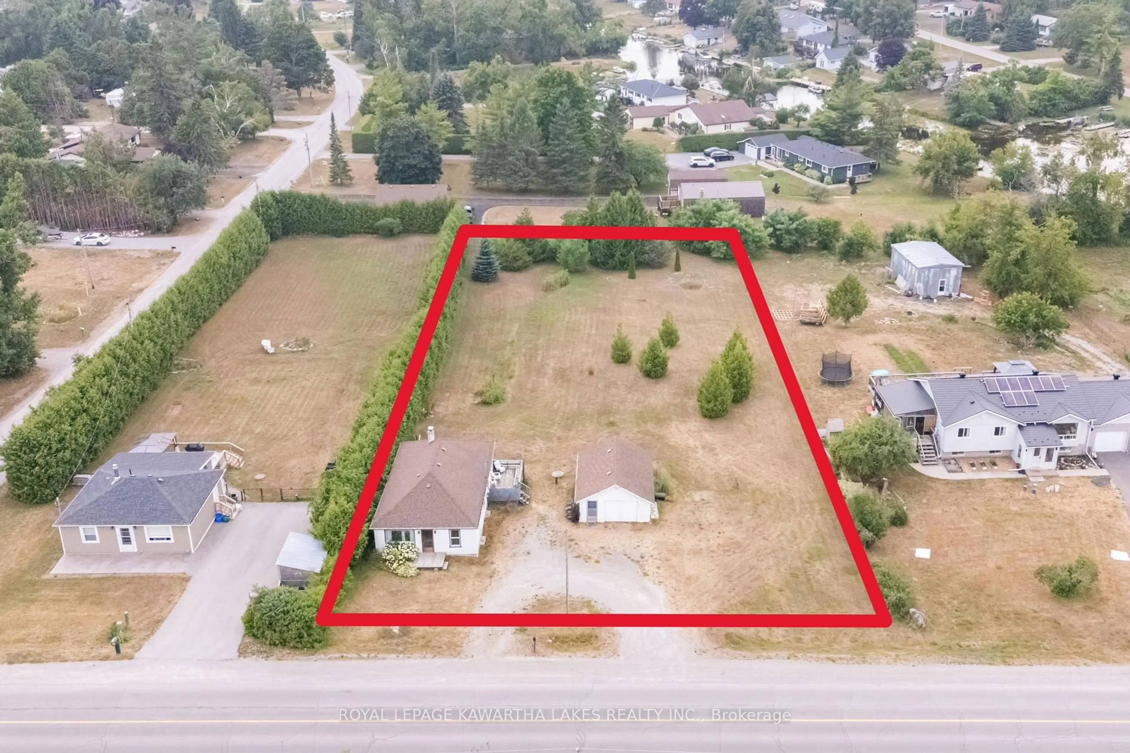 A pic from outside/outdoor area/front of a property/back of a property/a pic from drone, street for 221 Pleasant Point Rd, Kawartha Lakes Ontario K9V 4R6