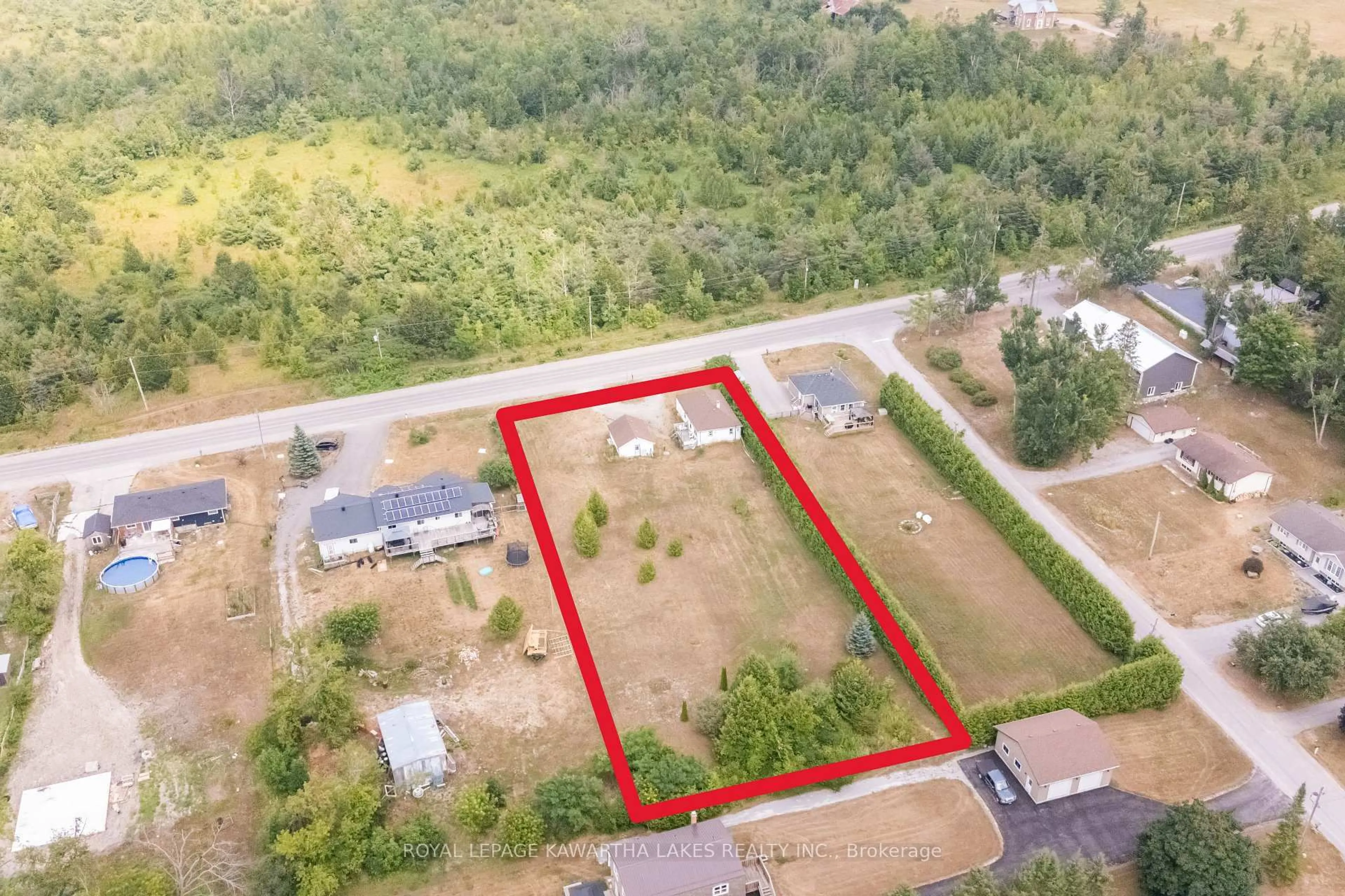 A pic from outside/outdoor area/front of a property/back of a property/a pic from drone, building for 221 Pleasant Point Rd, Kawartha Lakes Ontario K9V 4R6