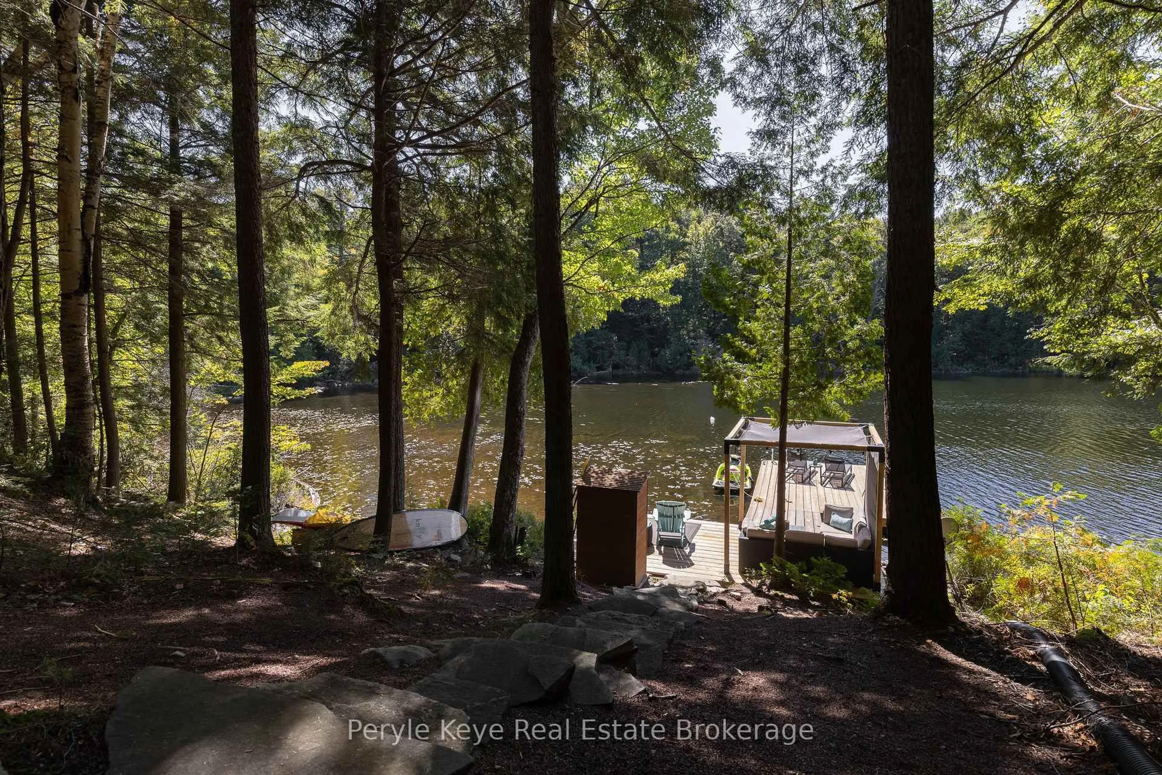 A pic from outside/outdoor area/front of a property/back of a property/a pic from drone, water/lake/river/ocean view for 1-1387 Oxbow Lake Rd, Lake of Bays Ontario P1H 2J6