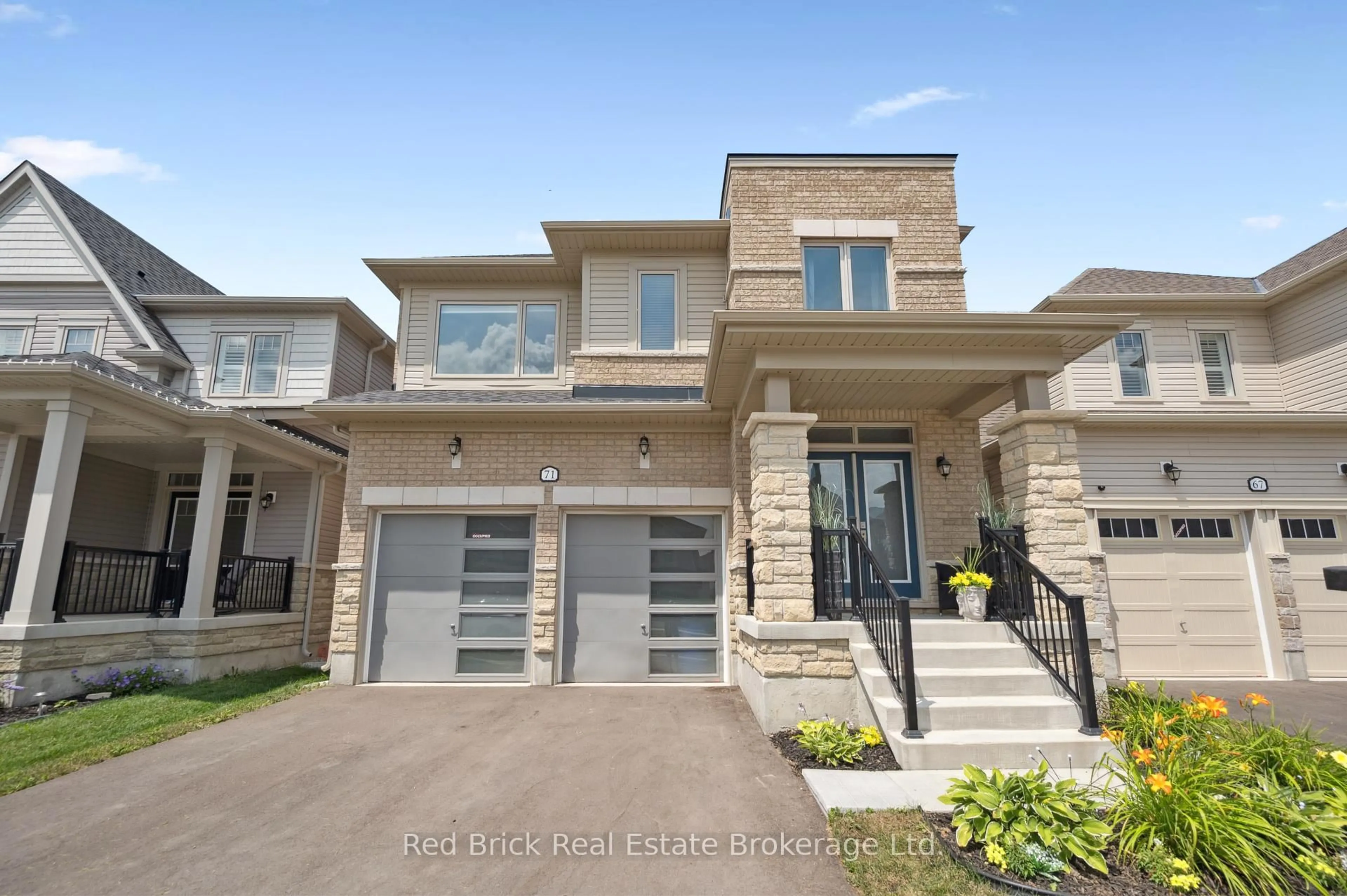 Home with brick exterior material, street for 71 Harpin Way, Centre Wellington Ontario N1M 0H8