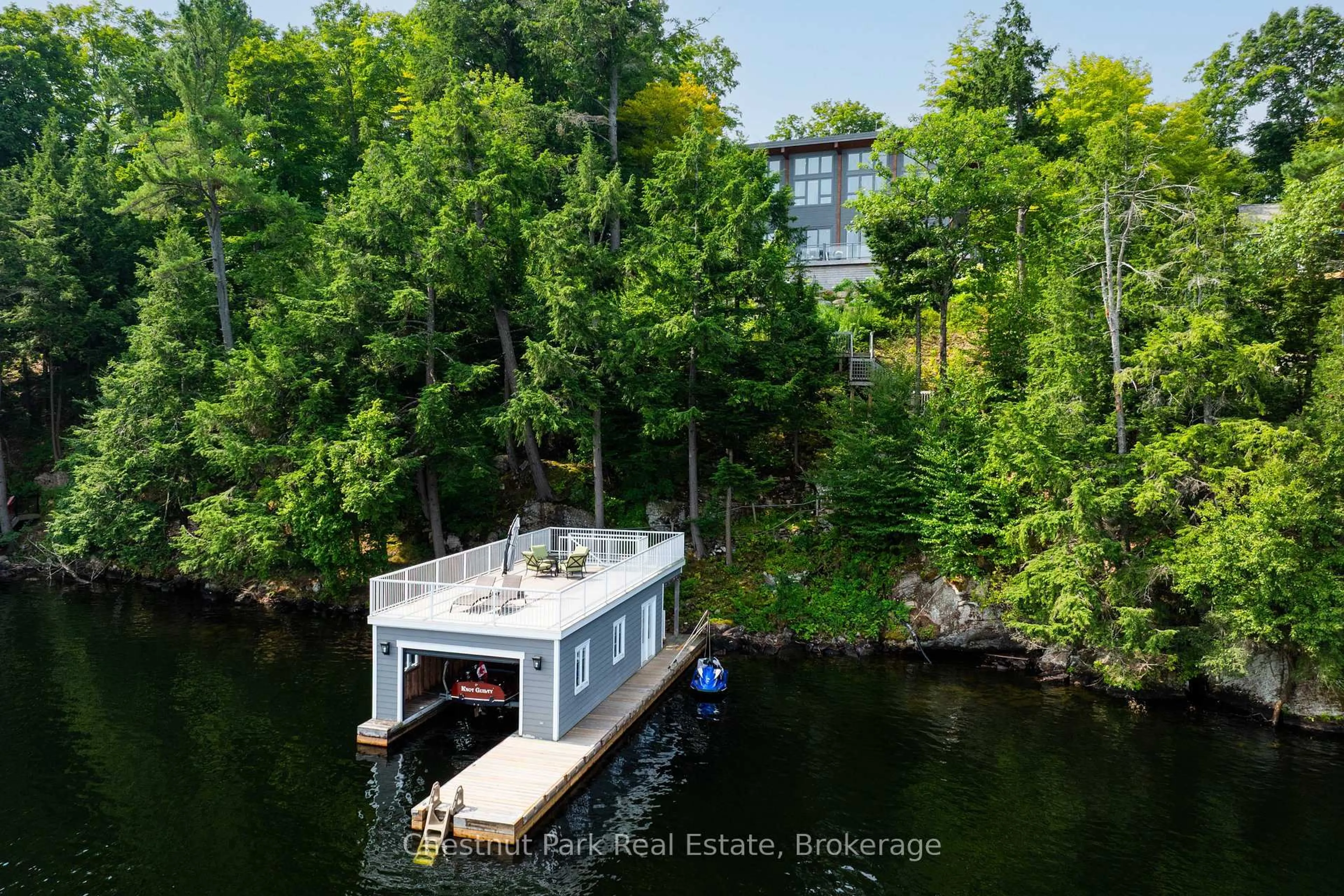 A pic from outside/outdoor area/front of a property/back of a property/a pic from drone, water/lake/river/ocean view for 1388 Peninsula Rd, Muskoka Lakes Ontario P0B 1J0