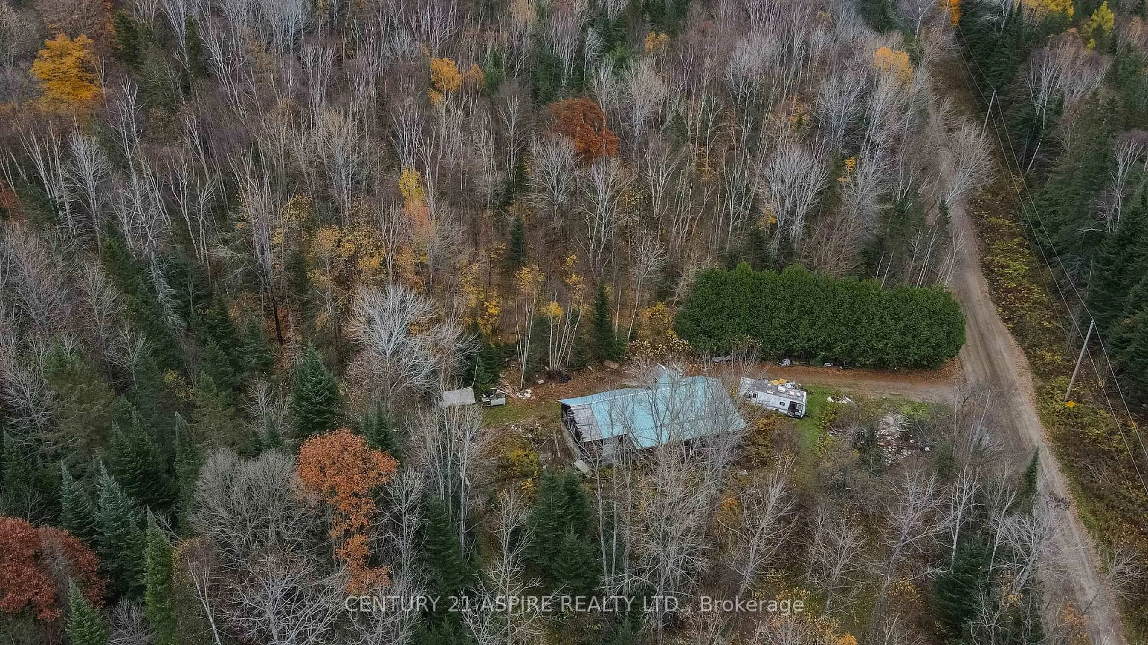 A pic from outside/outdoor area/front of a property/back of a property/a pic from drone, forest/trees view for 129 Mullen Rd, Combermere Ontario K0J 1L0