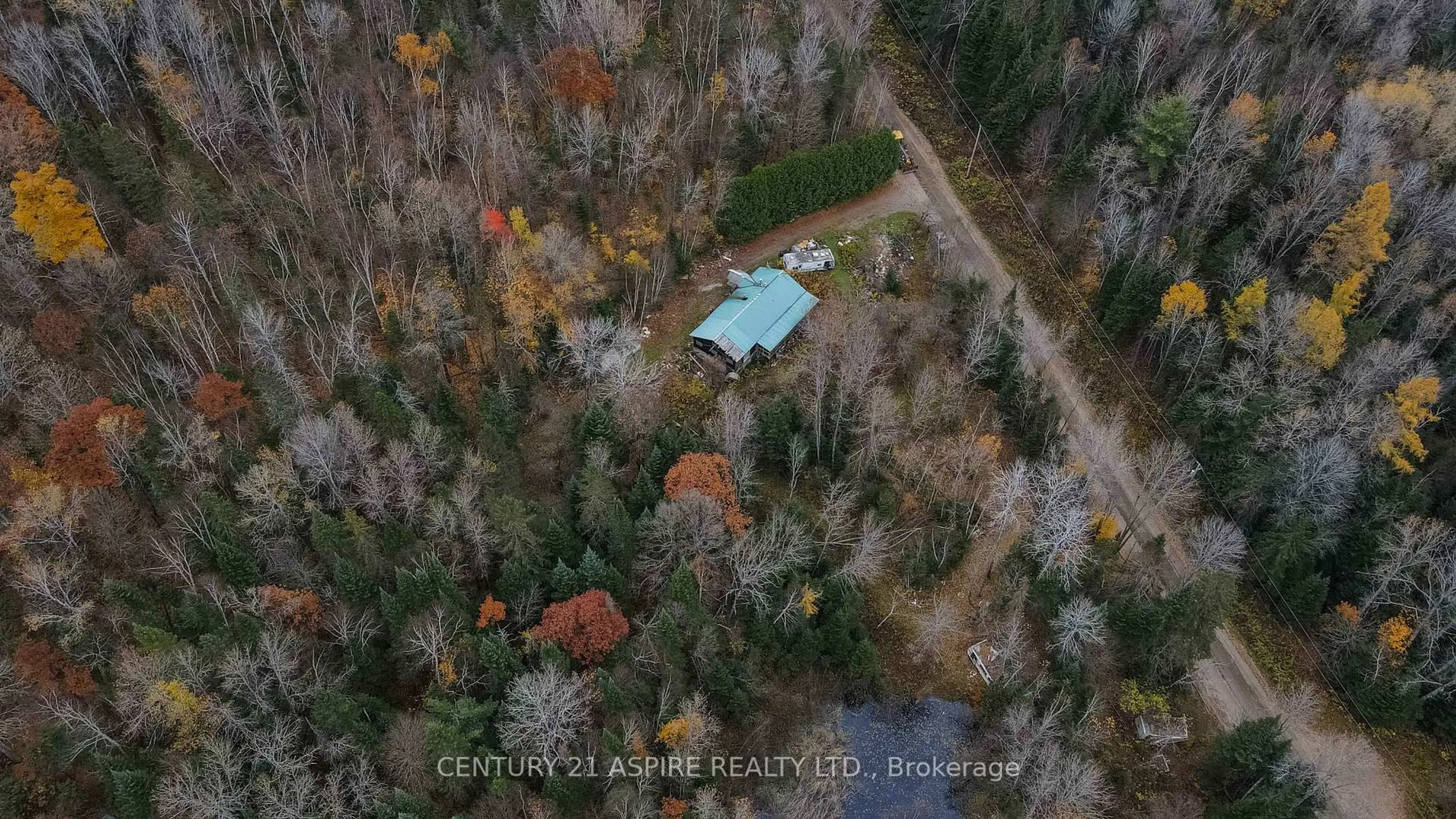A pic from outside/outdoor area/front of a property/back of a property/a pic from drone, forest/trees view for 129 Mullen Rd, Combermere Ontario K0J 1L0