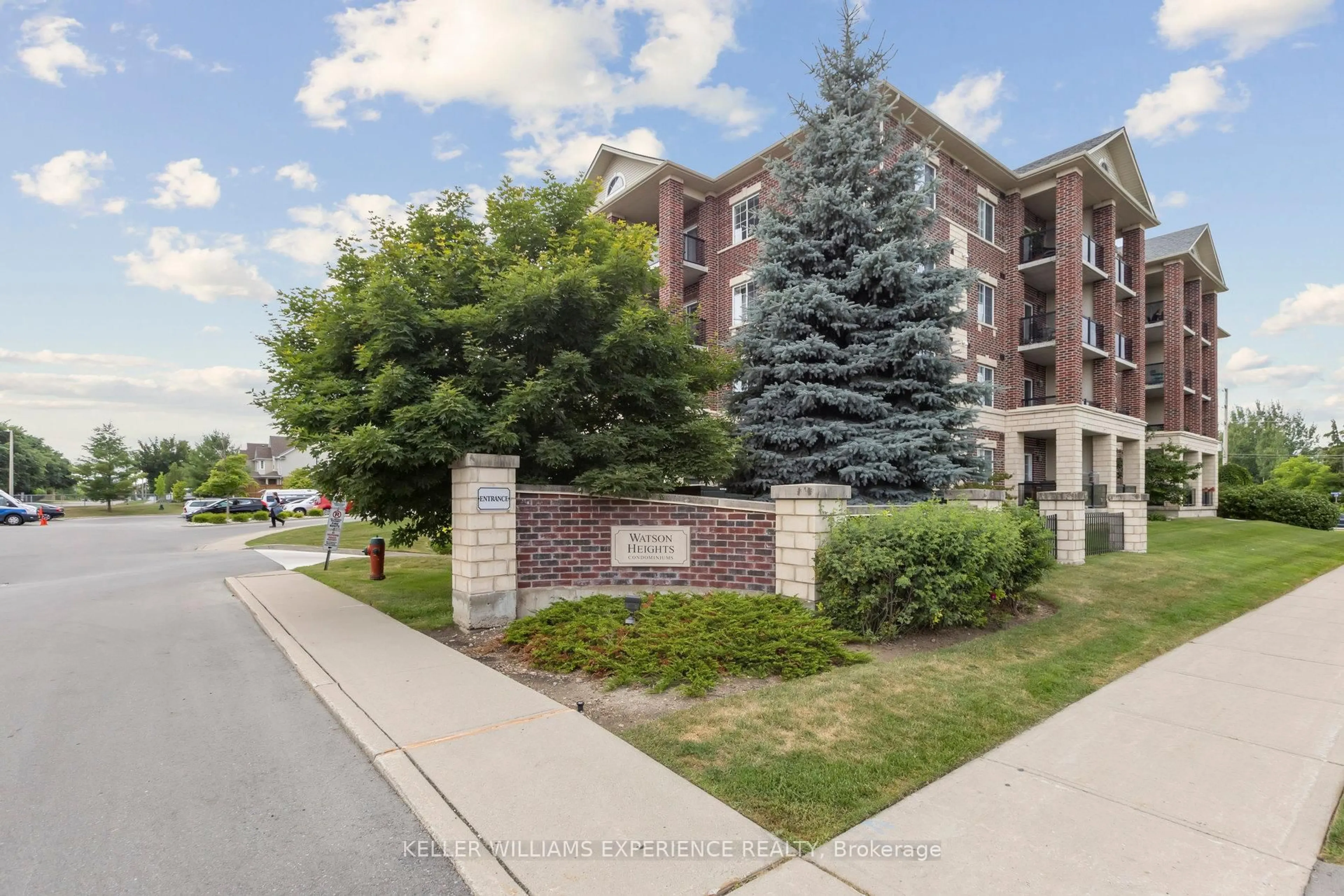A pic from outside/outdoor area/front of a property/back of a property/a pic from drone, street for 308 Watson Pkwy #301, Guelph Ontario N1E 0G7