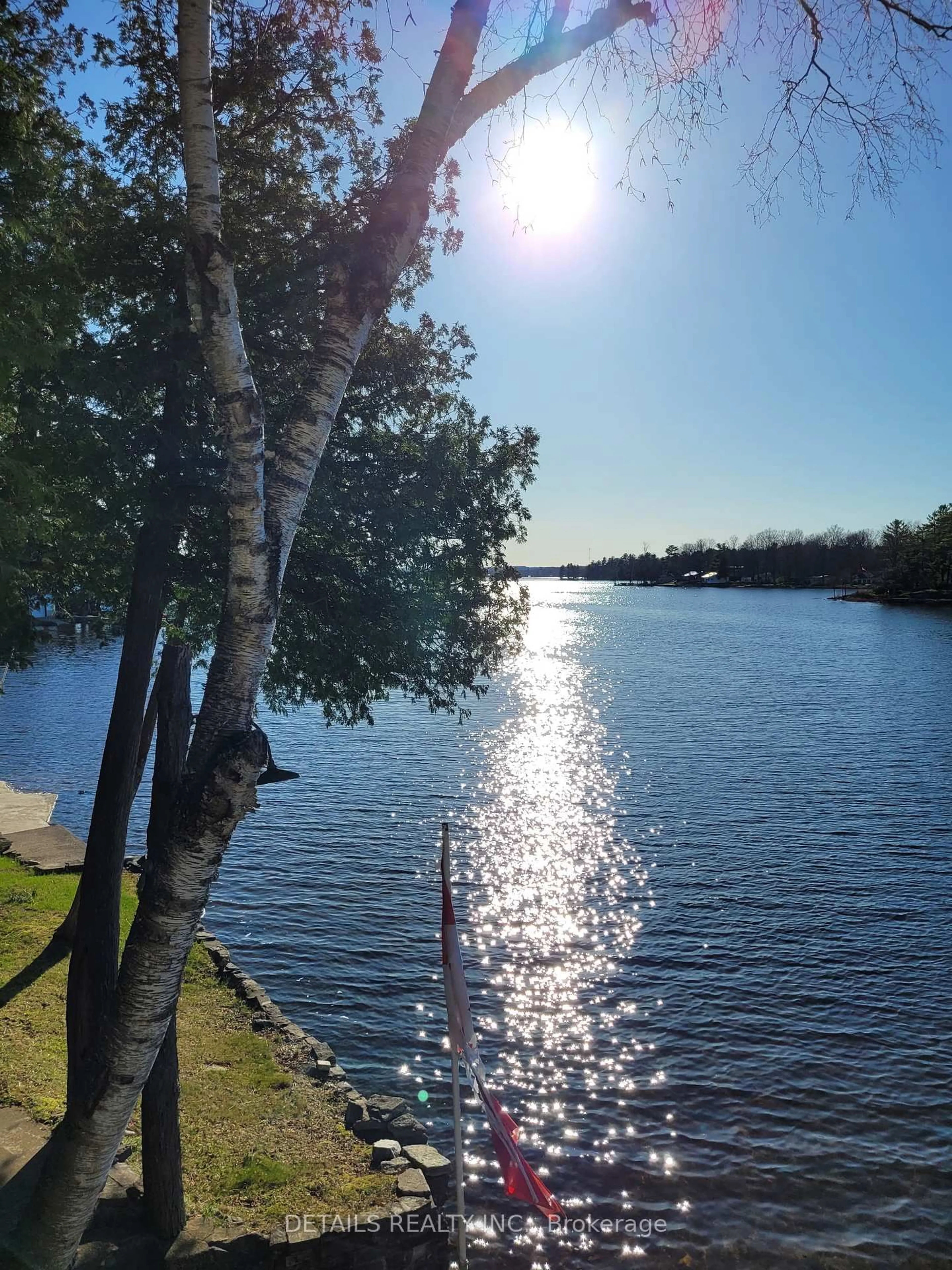 A pic from outside/outdoor area/front of a property/back of a property/a pic from drone, water/lake/river/ocean view for 63 Gordon Crt, Madoc Ontario K0K 2K0