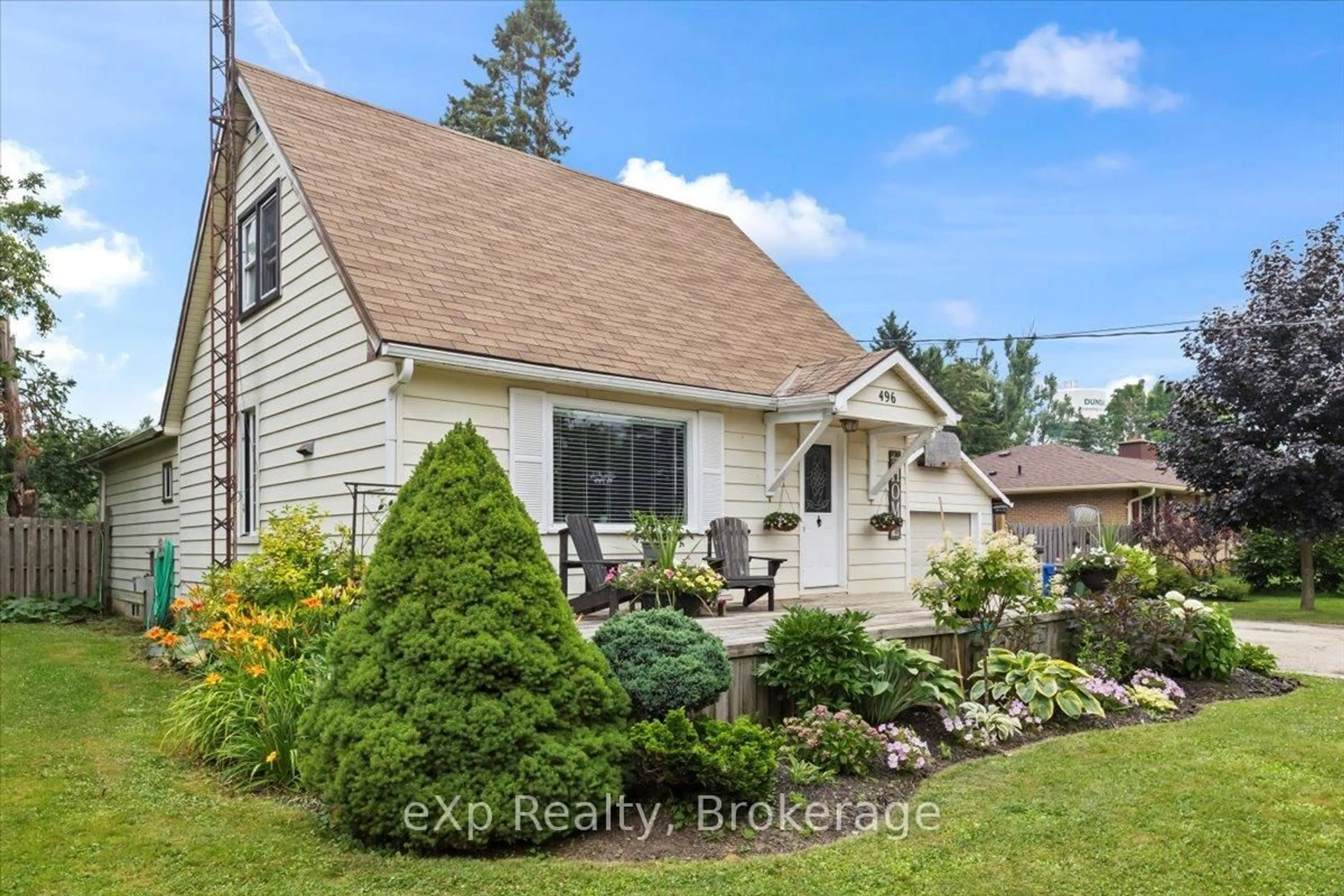 A pic from outside/outdoor area/front of a property/back of a property/a pic from drone, unknown for 496 Main St, Southgate Ontario N0C 1B0