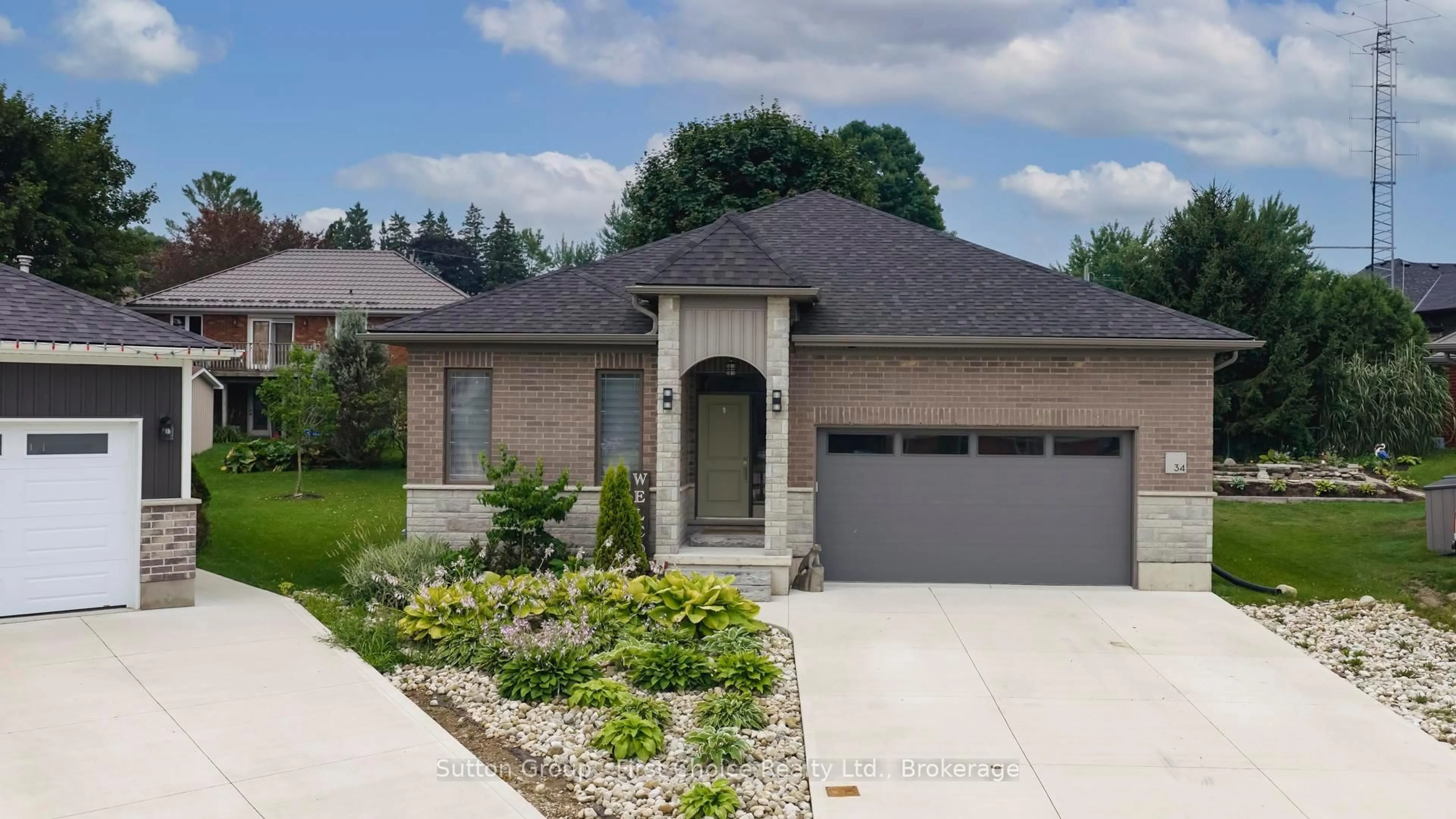 Home with brick exterior material, street for 34 Yost Crt, Perth East Ontario N0K 1M0