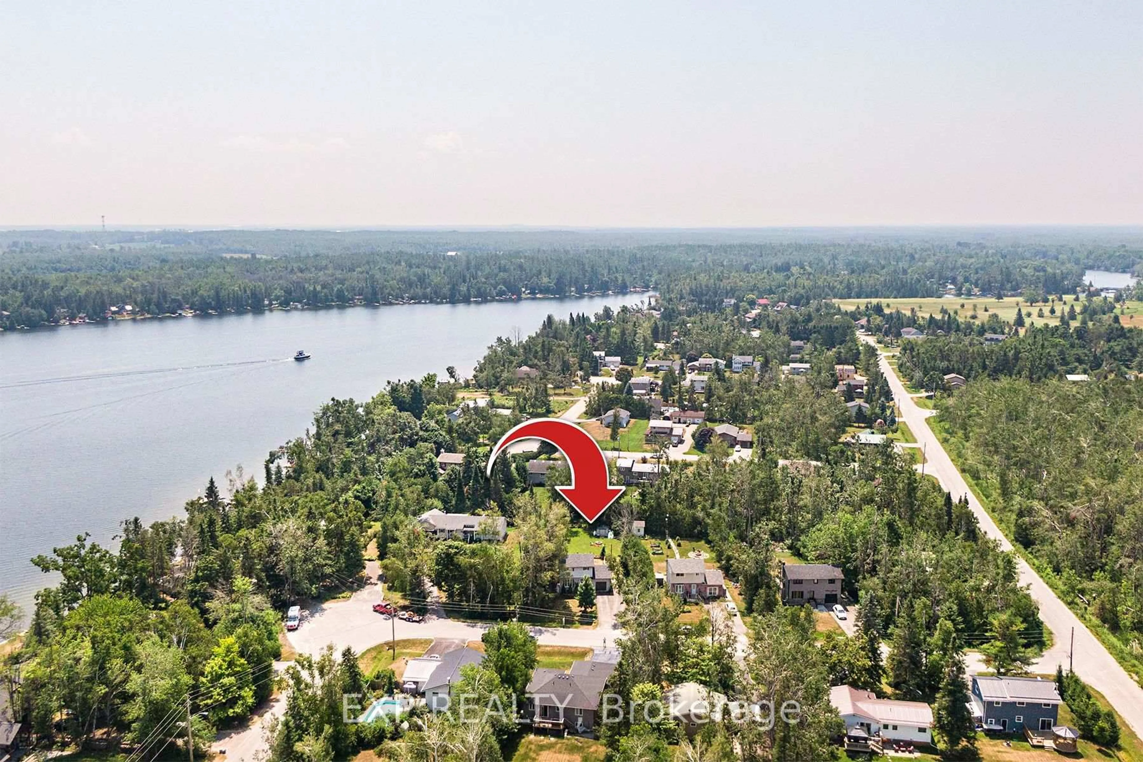 A pic from outside/outdoor area/front of a property/back of a property/a pic from drone, water/lake/river/ocean view for 8 Pinewood Blvd, Kawartha Lakes Ontario K0M 2T0