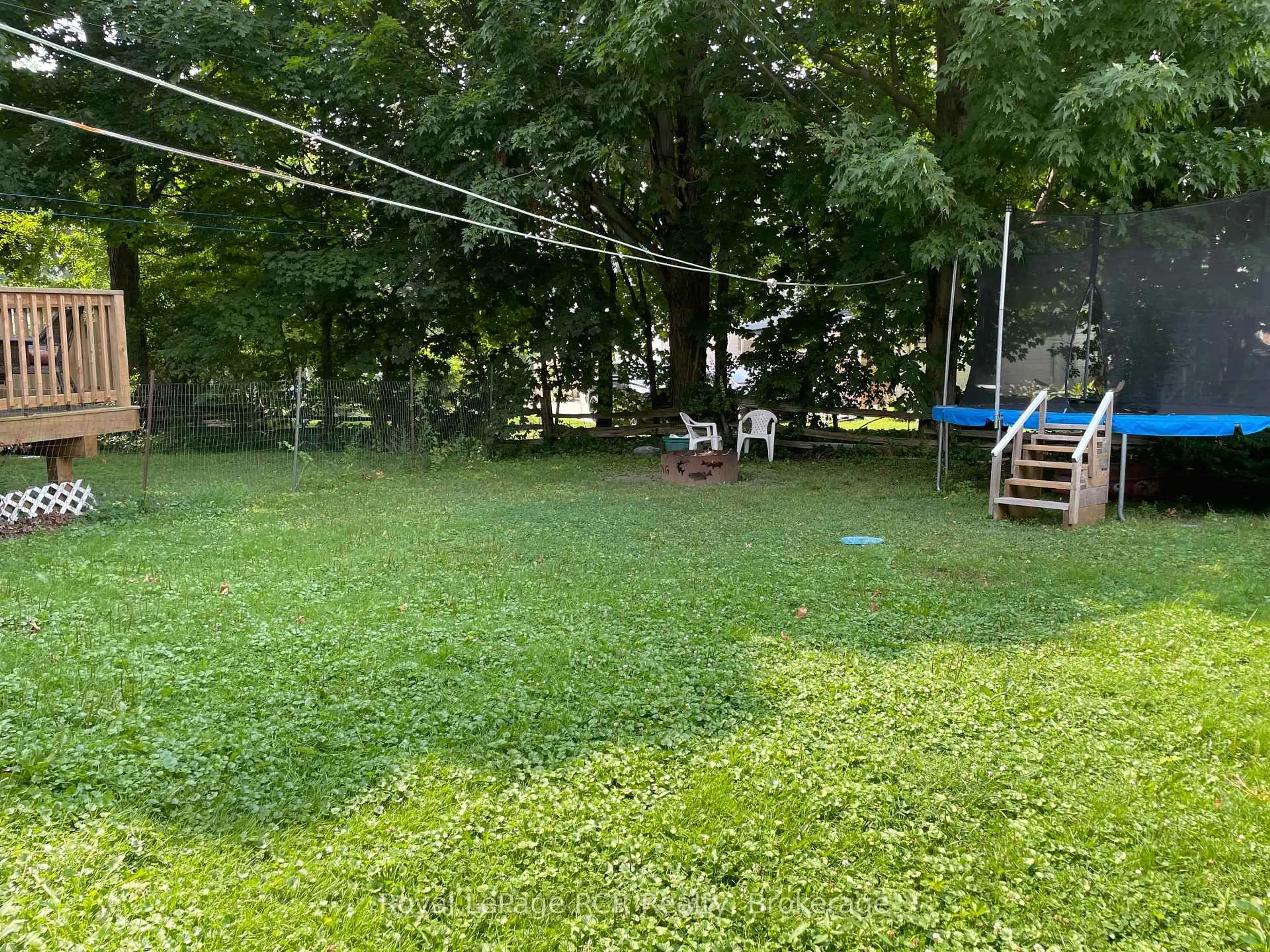 A pic from outside/outdoor area/front of a property/back of a property/a pic from drone, forest/trees view for 146-148 Frances St, North Huron Ontario N0G 2W0