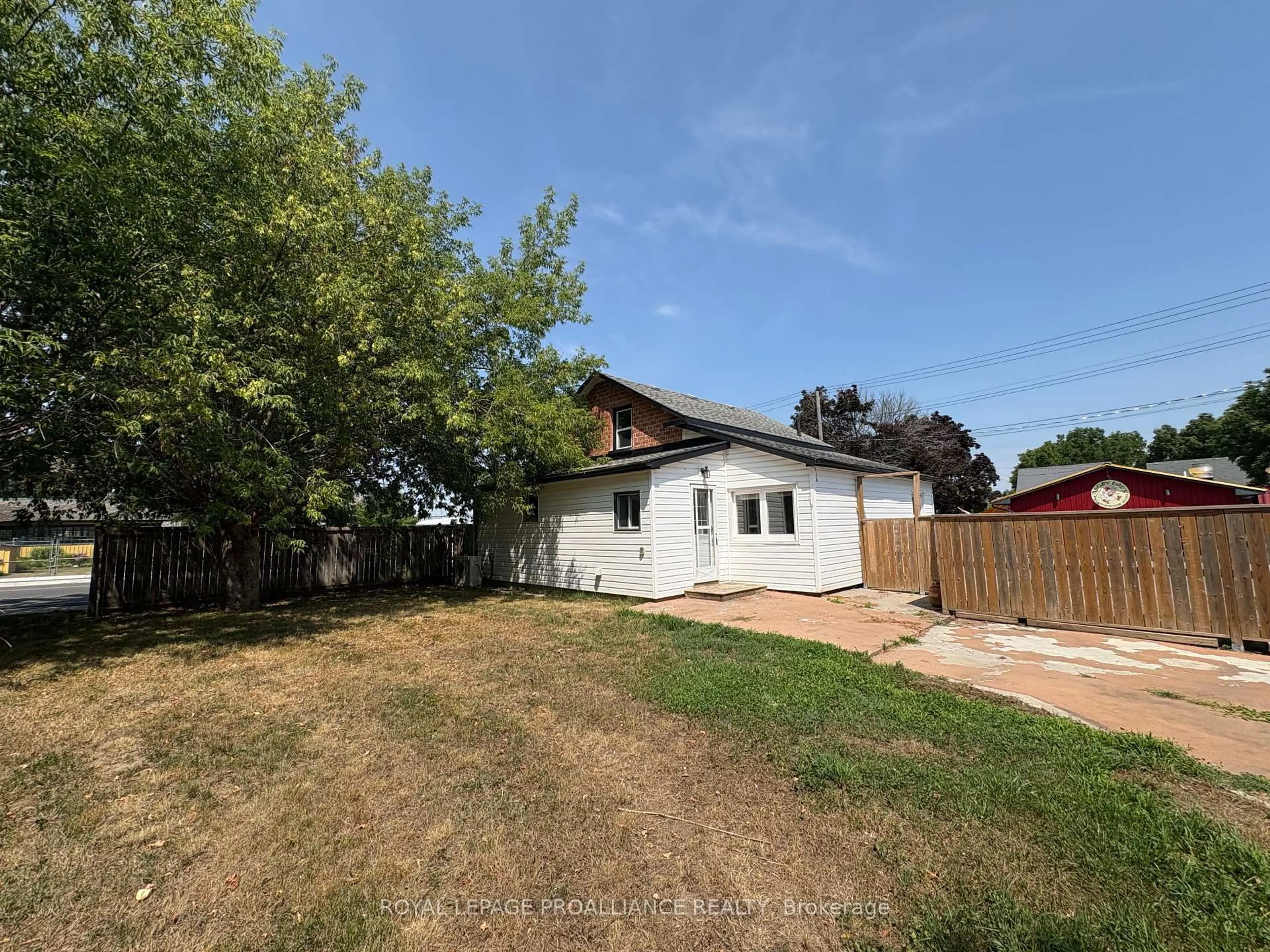 A pic from outside/outdoor area/front of a property/back of a property/a pic from drone, street for 374 Main St, Prince Edward County Ontario K0K 2T0