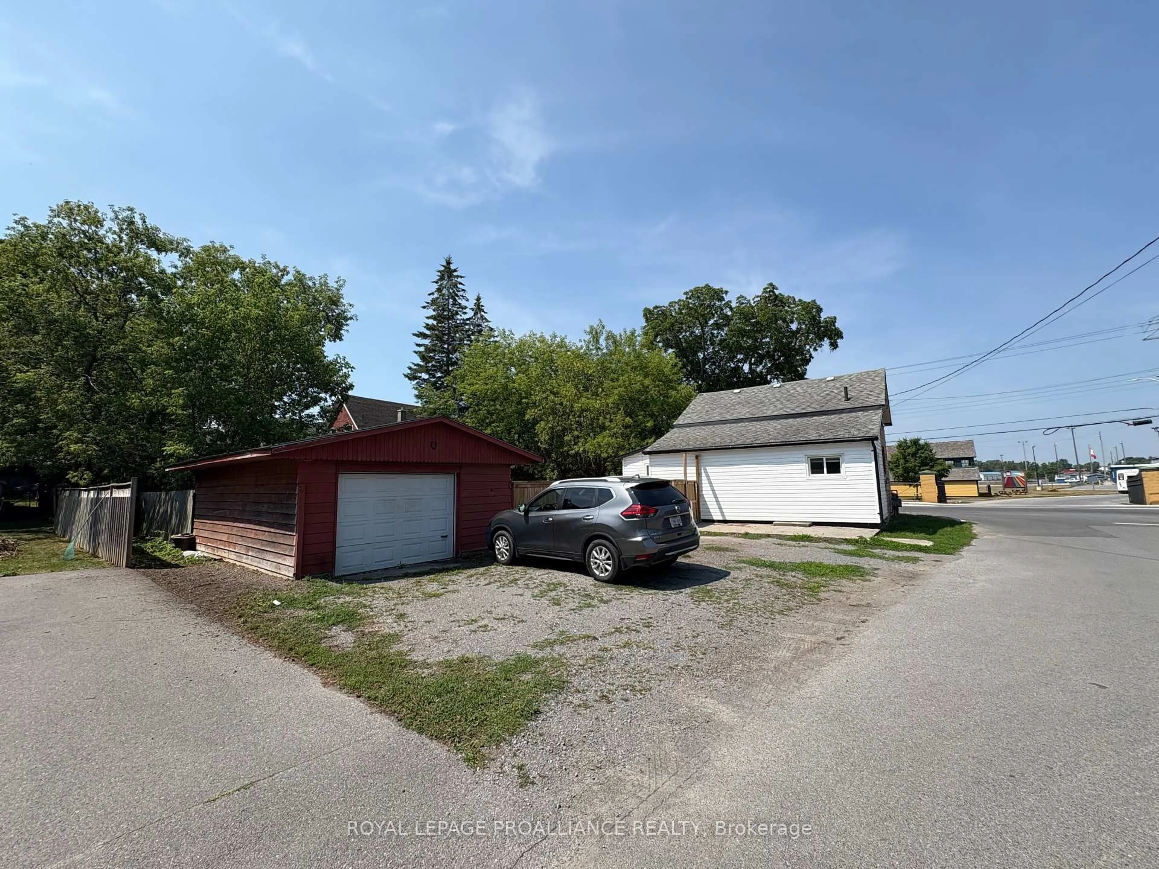 A pic from outside/outdoor area/front of a property/back of a property/a pic from drone, street for 374 Main St, Prince Edward County Ontario K0K 2T0